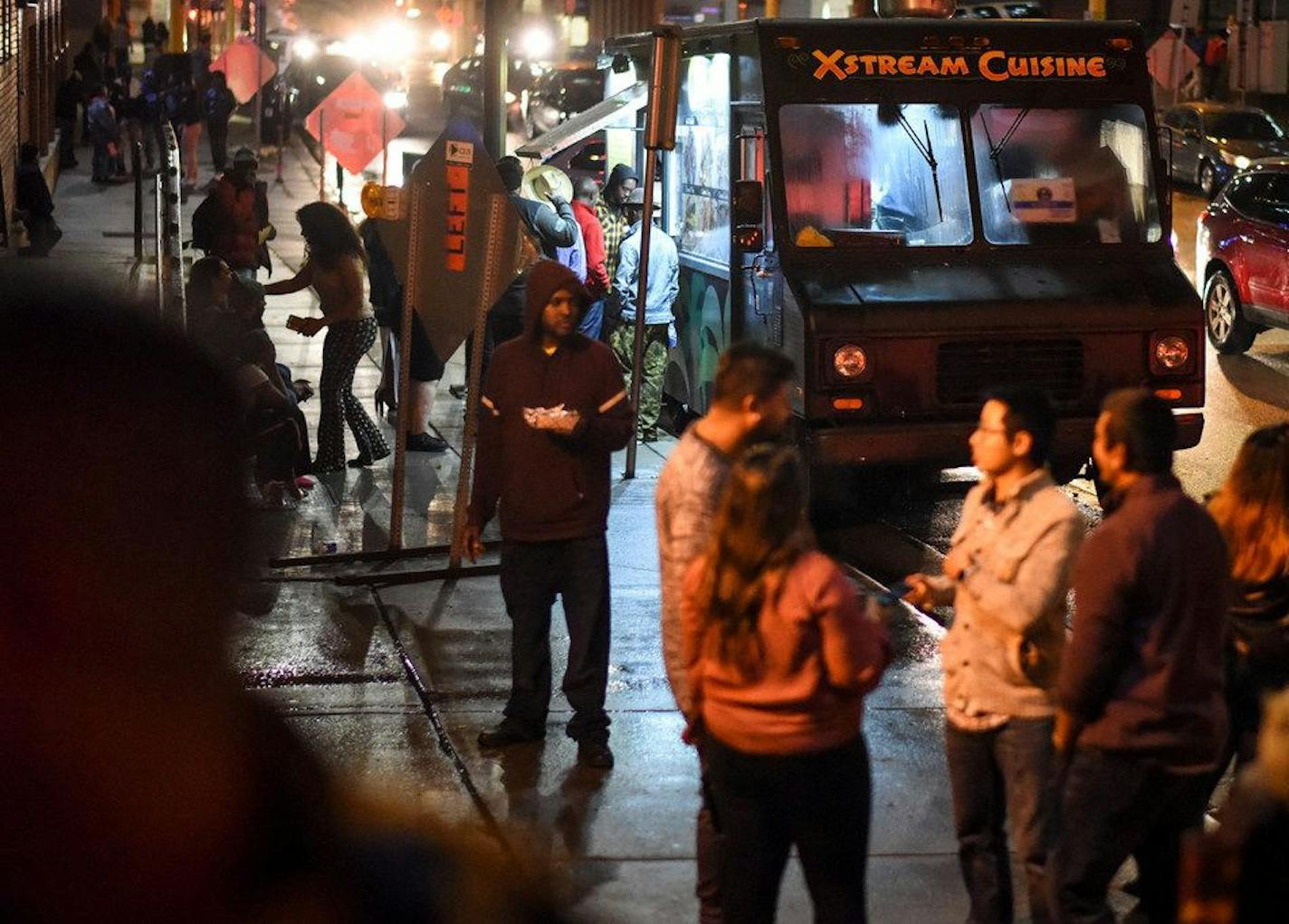 After bar close early Saturday morning, patrons lined up outside the Xstream Cuisine food truck in downtown Minneapolis, on Oct. 27, 2018.