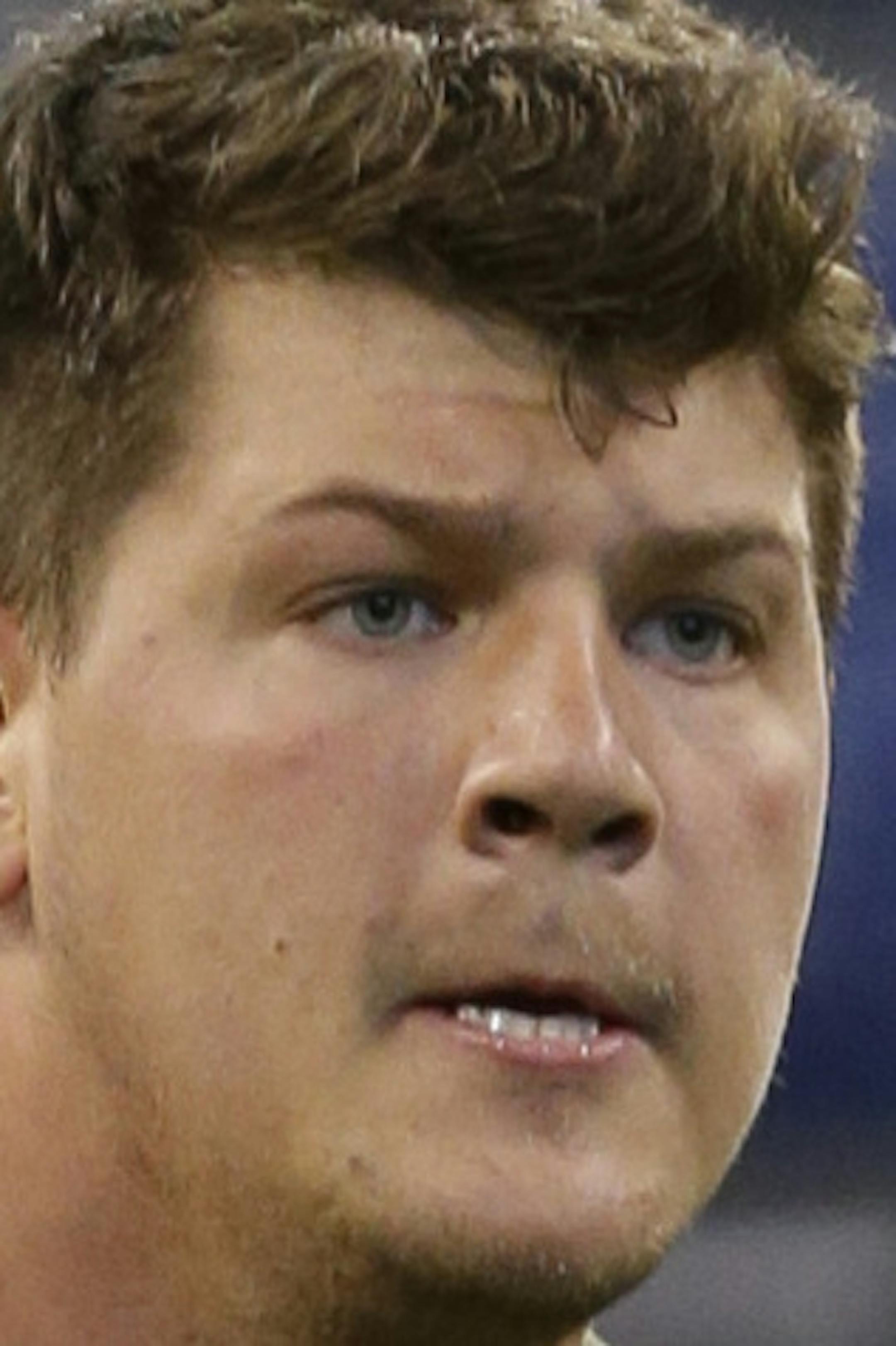 Michigan offensive lineman Taylor Lewan runs a drill at the NFL football scouting combine in Indianapolis, Saturday, Feb. 22, 2014. (AP Photo/Michael Conroy) ORG XMIT: NYOTK