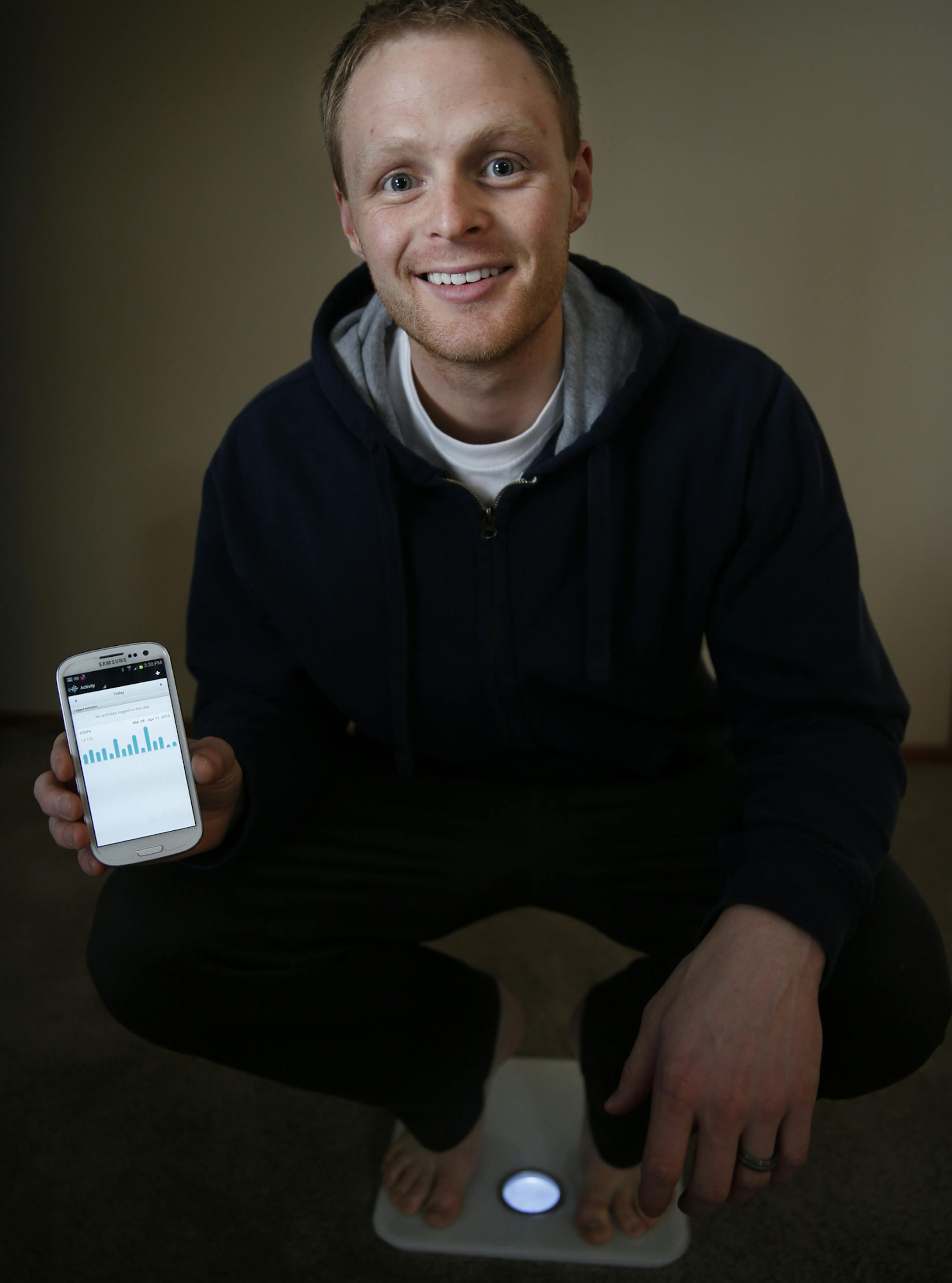 At his home in Maple Grove, Jared Sieling uses a scale that automatically sends his weight and body fat to a database which he can track with his smartphone or computer. With his smartphone he is also able to track the number of steps he takes during the day using the FitBit pedometer. It also automatically sends the data over the internet so he can track it.]rtsong-taatarii@startribune.com
