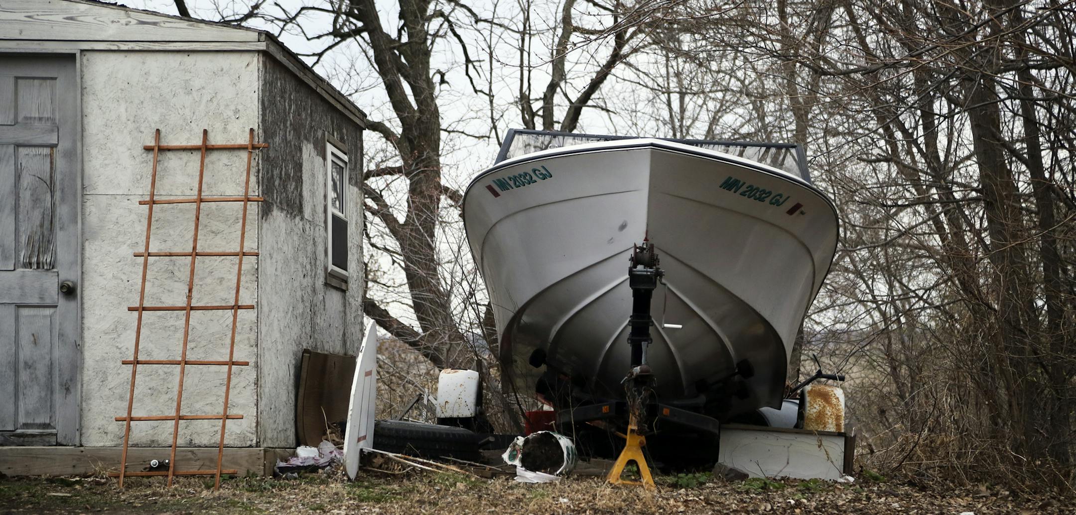 Ted Oakland is the City of Burnsville protective zoning enforcement officer and was out on patrol Wednesday, April 23, 2014, in Burnsville, MN. Here, a recreational boat and other rubbish scattered in a yard on the western part of Burnsville constitute a violation, Oakland said.](DAVID JOLES/STARTRIBUNE) djoles@startribune.com It could be one of the most thorough inspection programs in the Twin Cities suburbs. The city of Burnsville does a drive-by inspection of EVERY property in the city on a t