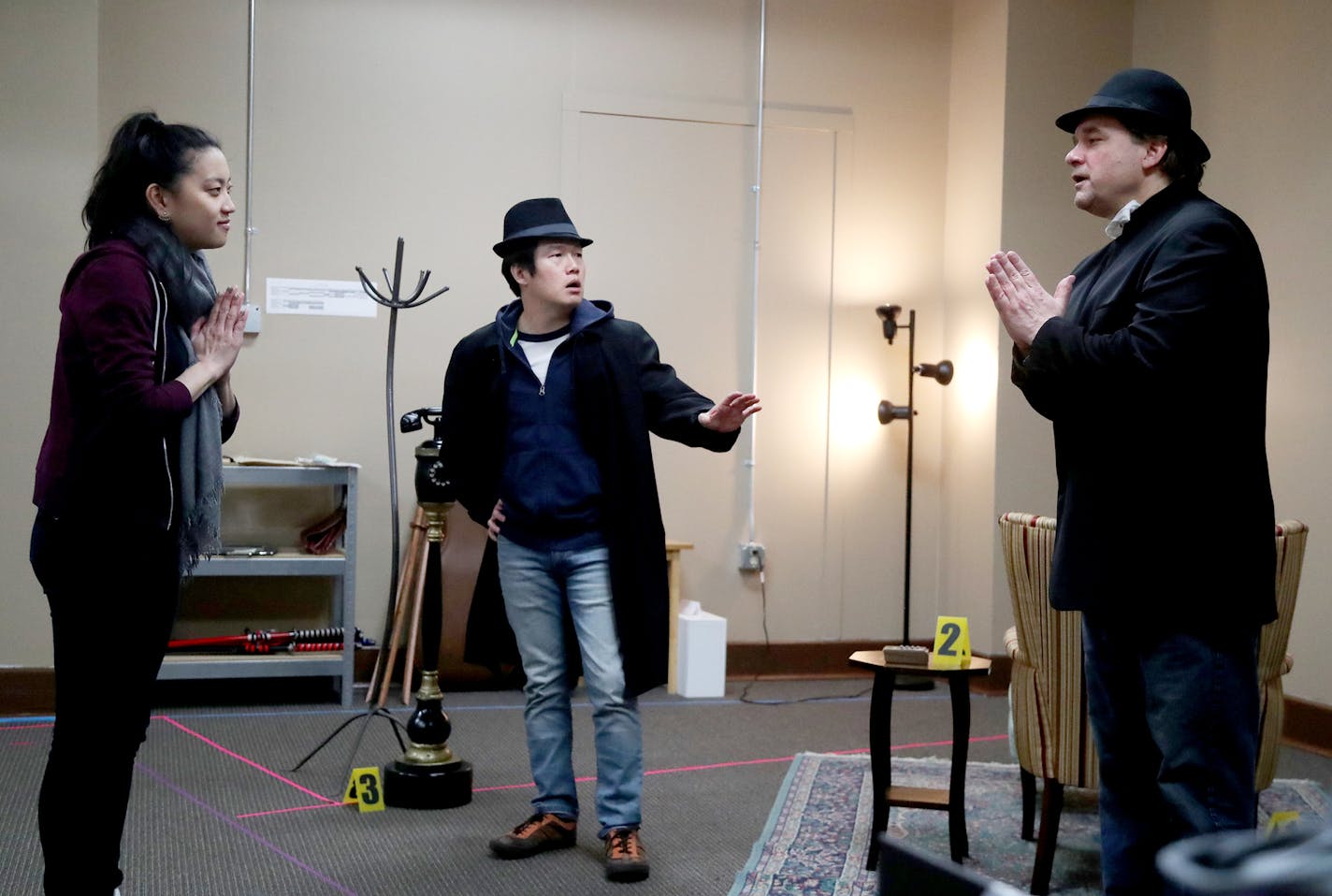 Hope Nordquist, Eric Sharp and Luverne Seifert rehearsed &#x201c;Charles Francis Chan Jr.&#x2019;s Exotic Oriental Murder Mystery&#x201d; at the Guthrie.