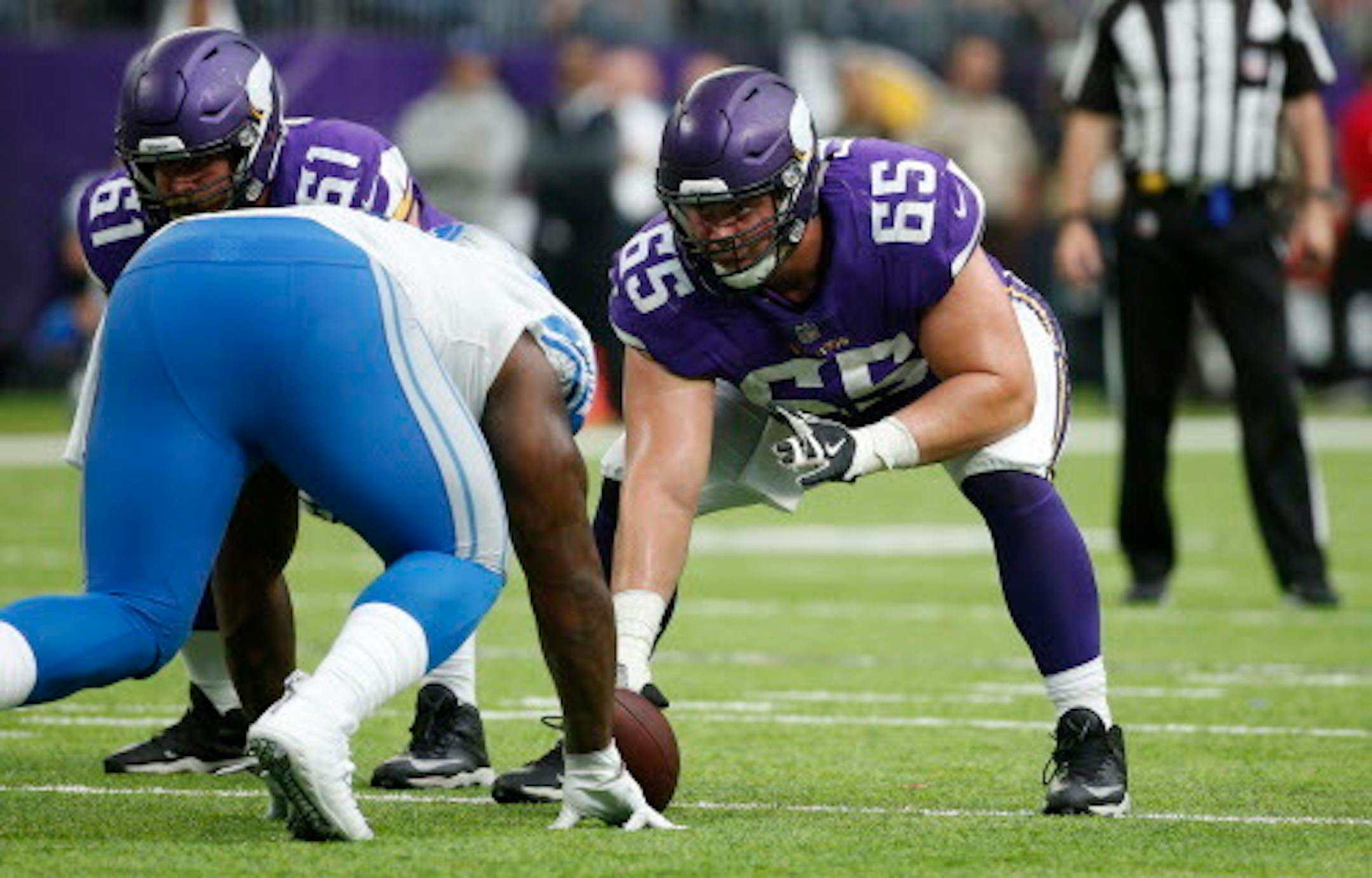 Minnesota Vikings center Pat Elflein (65) gets set for a play during the second half of an NFL football game against the Detroit Lions, Sunday, Oct. 1, 2017, in Minneapolis. The Lions won 14-7. (AP Photo/Bruce Kluckhohn) ORG XMIT: MNCN1