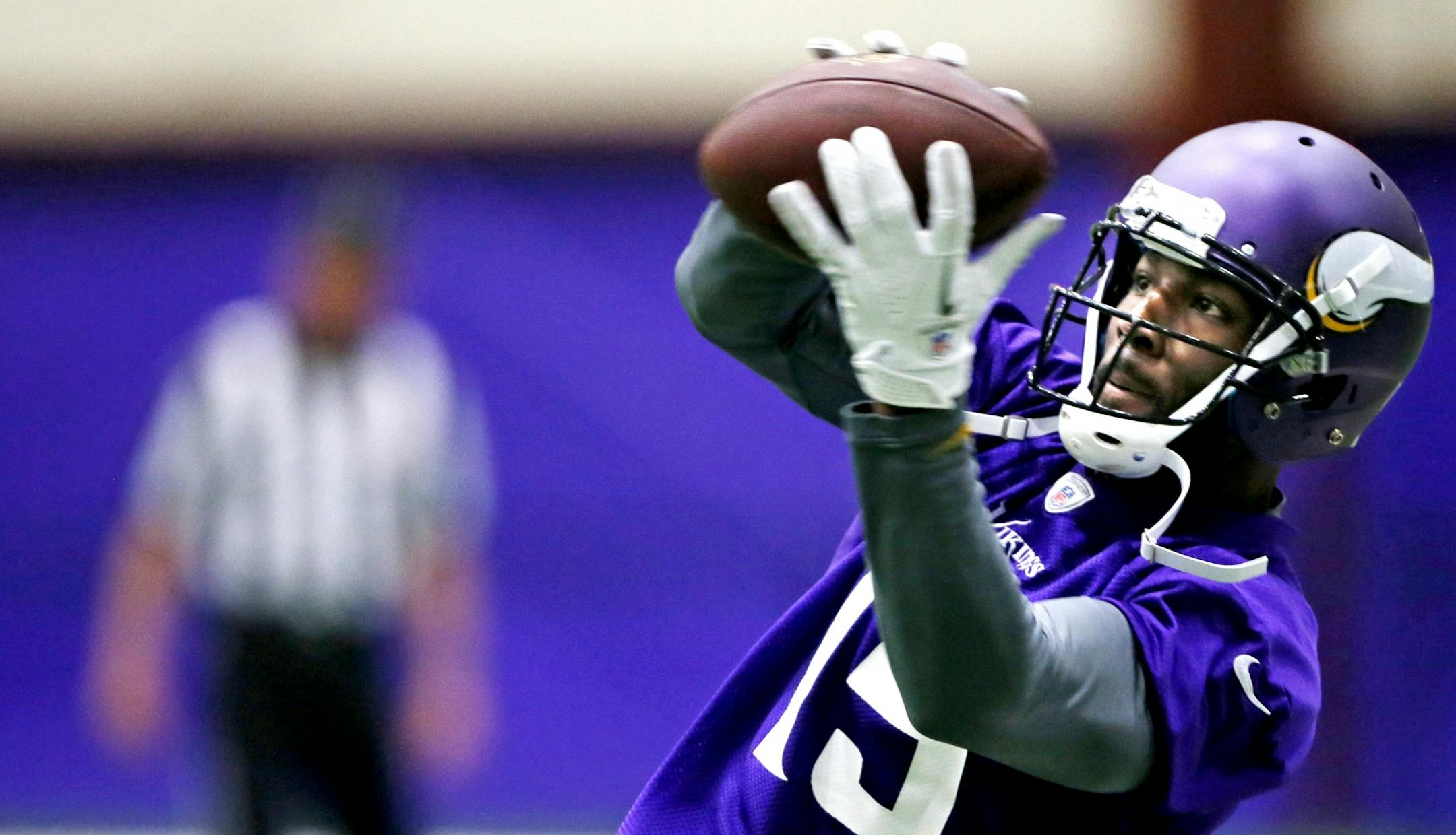 Receiver Greg Jennings pulled down a pass during Minnesota Vikings OTA practice Wednesday June, 5 2013 in Eden Prairie, MN.