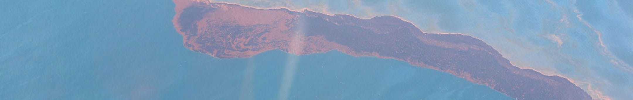 Surface oil from the BP Deepwater Horizon spill disaster is photographed near Pass a Loutre, Louisiana, in this image taken May 25, 2010. It shows dark brown and red emulsion in the convergence zone with dull and silver-colored sheens. Illustrates FISH (category a), by Darryl Fears © 2014, The Washington Post. Moved Monday, March 24, 2014. (MUST CREDIT: Courtesy of NOAA)