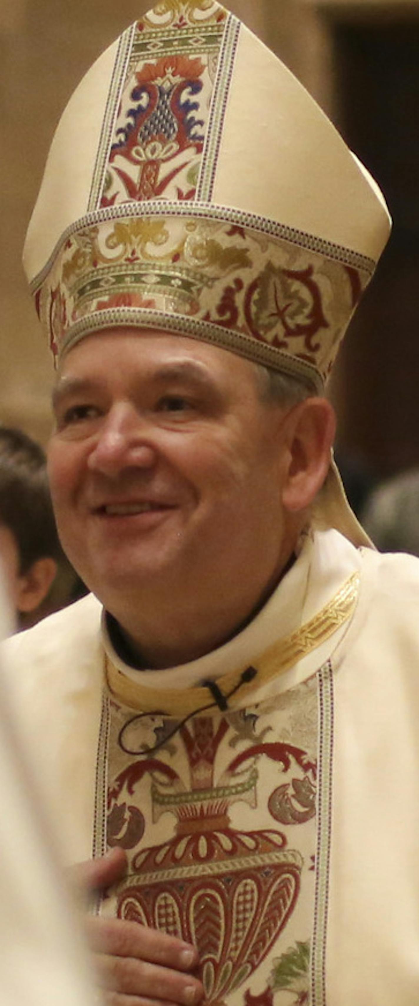 The Most Rev. Bernard Hebda processed towards the altar at the start of the Evening Mass of the Lord's Supper Thursday night at the Cathedral of St. Paul. ] JEFF WHEELER &#xef; jeff.wheeler@startribune.com The Most Rev. Bernard Hebda was named Archbishop of the Archdiocese of St. Paul and Minneapolis by Pope Francis Thursday. Thursday evening, March 23, 2016 he presided over the Maundy Thursday mass at the Cathedral of St. Paul, during which he performed the traditional rite of washing and dryin