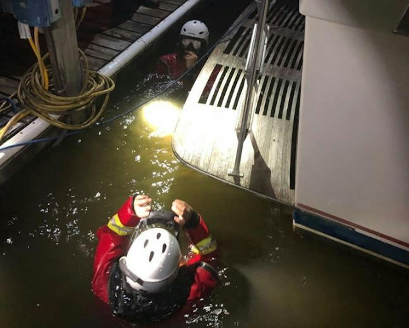 The South Metro Fire Department was called to assist with a search for a person missing in the water at one of the area marinas. Along with a boat, four rescue swimmers located the man's body. Credit: South Metro Fire Department