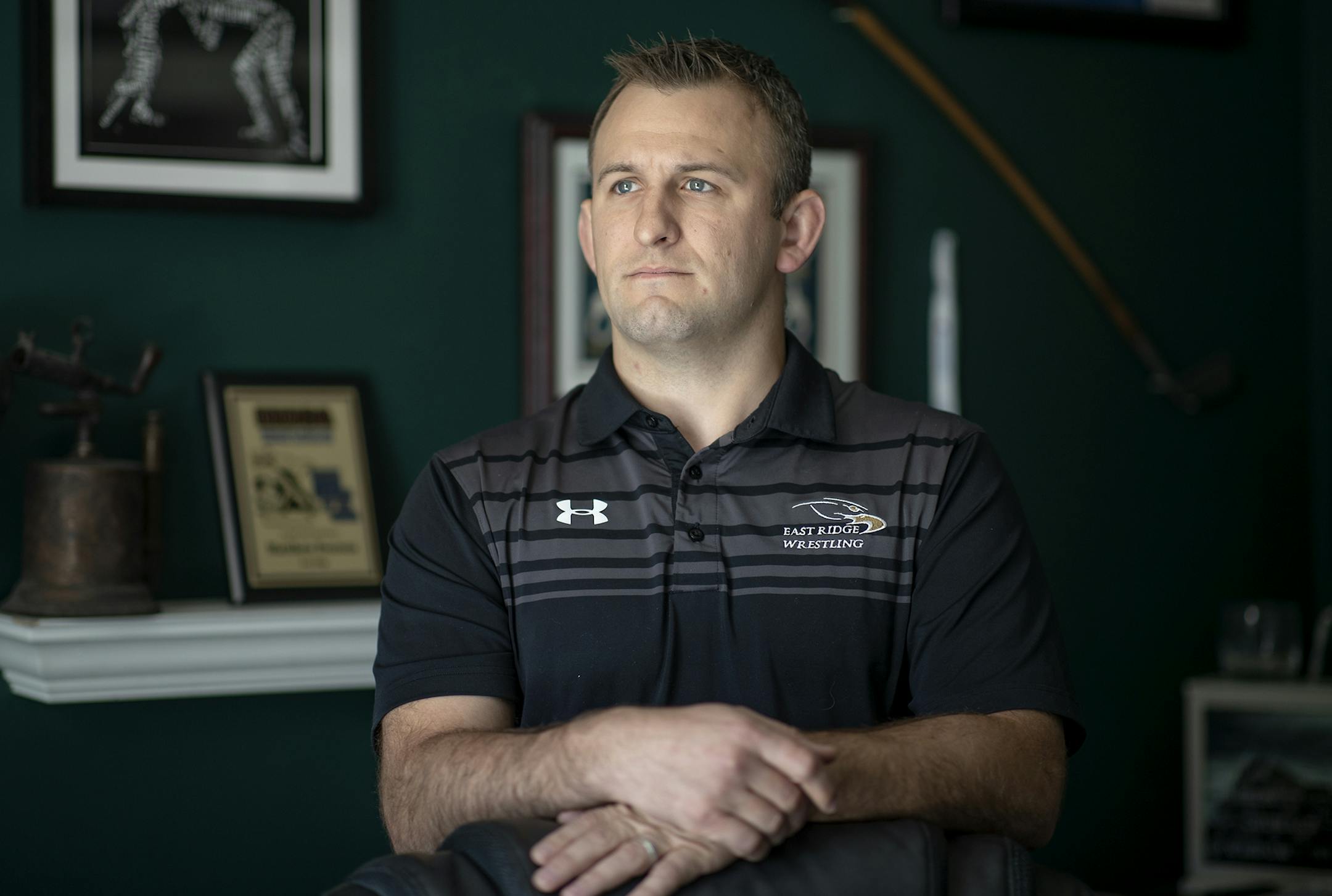 Former East Ridge wrestling coach Matt Everson, who works from home, is pushing back against the school district for what he claims are false reasons that led to his coaching contract not getting renewed. Photo: ELIZABETH FLORES • liz.flores@startribune.com
