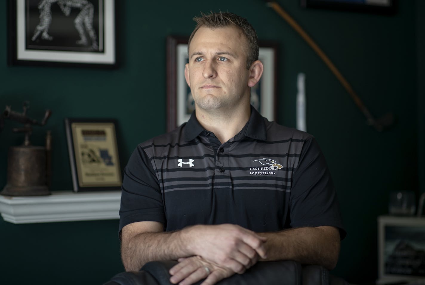 Former East Ridge wrestling coach Matt Everson, who works from home, is pushing back against the school district for what he claims are false reasons that led to his coaching contract not getting renewed. Photo: ELIZABETH FLORES • liz.flores@startribune.com