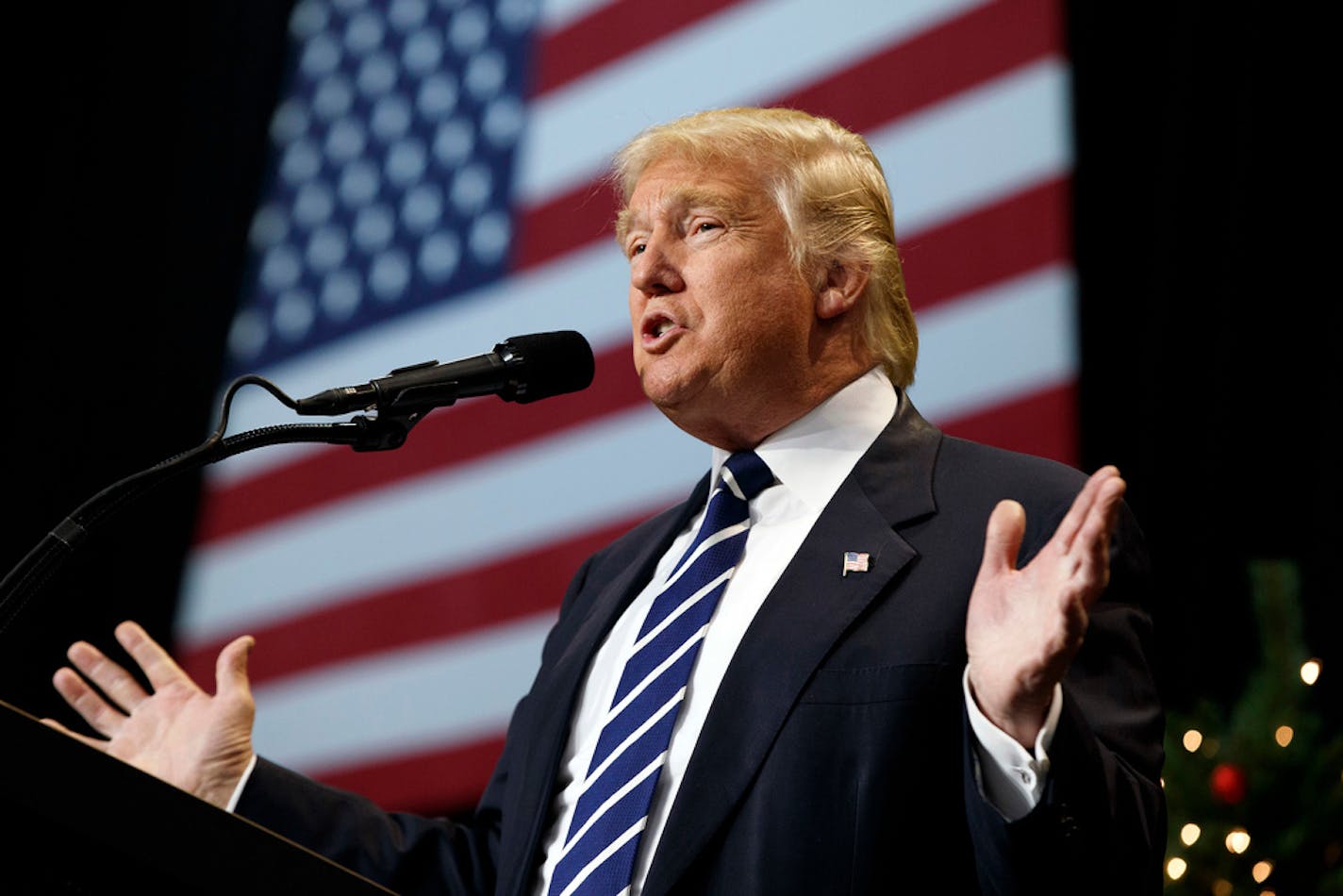 FILE - In this Dec. 13, 2016, photo, President-elect Donald Trump speaks during a rally at the Wisconsin State Fair Exposition Center in West Allis, Wis on Dec. 13, 2016. Two Wisconsin Democratic electors and a voter on Tuesday, May 17, 2021, sued Republicans who attempted to cast electoral ballots for Donald Trump in 2020 despite Joe Biden's victory in the battleground state. (AP Photo/Evan Vucci File)