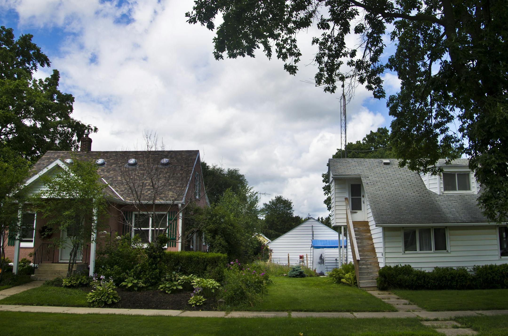 A Rochester woman has admitted that she bilked her elderly neighbors out of more than $800,000 with a sob story about having to go to Washington, D.C., to tend to her dead daughter's affairs and also to go to Italy for business purposes. The house on the left was Carolyn Cassar's who bilked the money from the neighbors next door at the white house, photographed on Friday July 26, 2013 in Rochester, Minn. ] (RENEE JONES SCHNEIDER * reneejones@startribune.com)