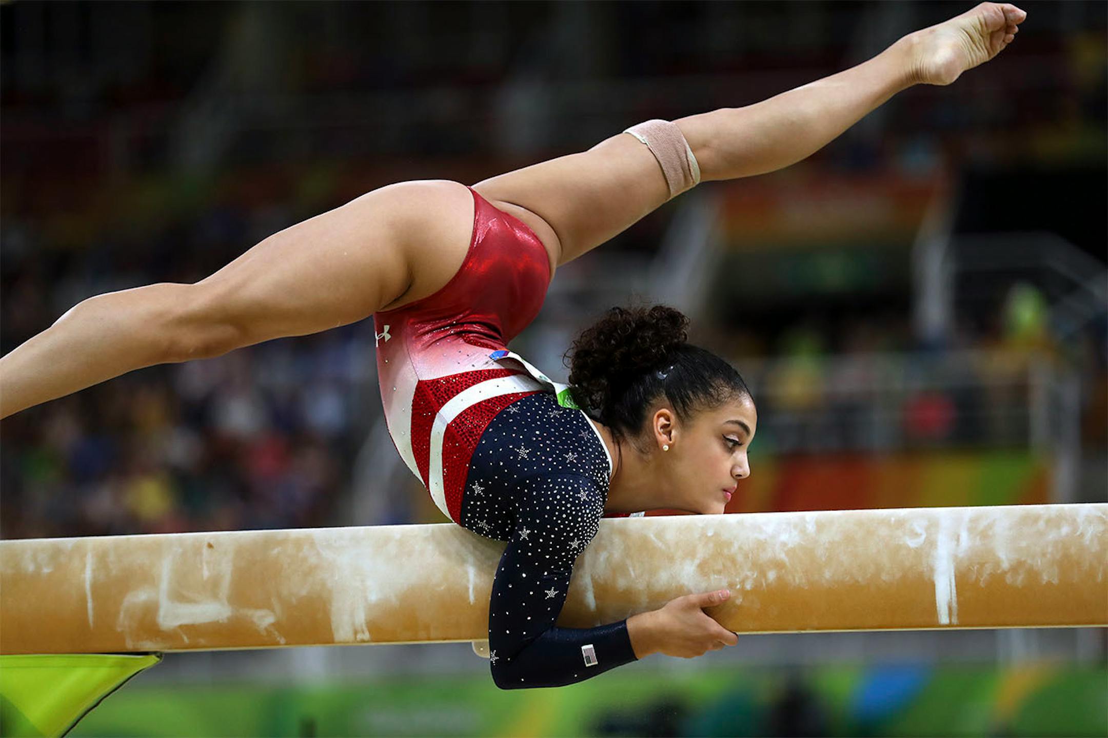 USA women's Gymnastic team took home the gold medal in team competition for the 2nd straight Olympics. Here, Lauren Hernandez competes on the beam.