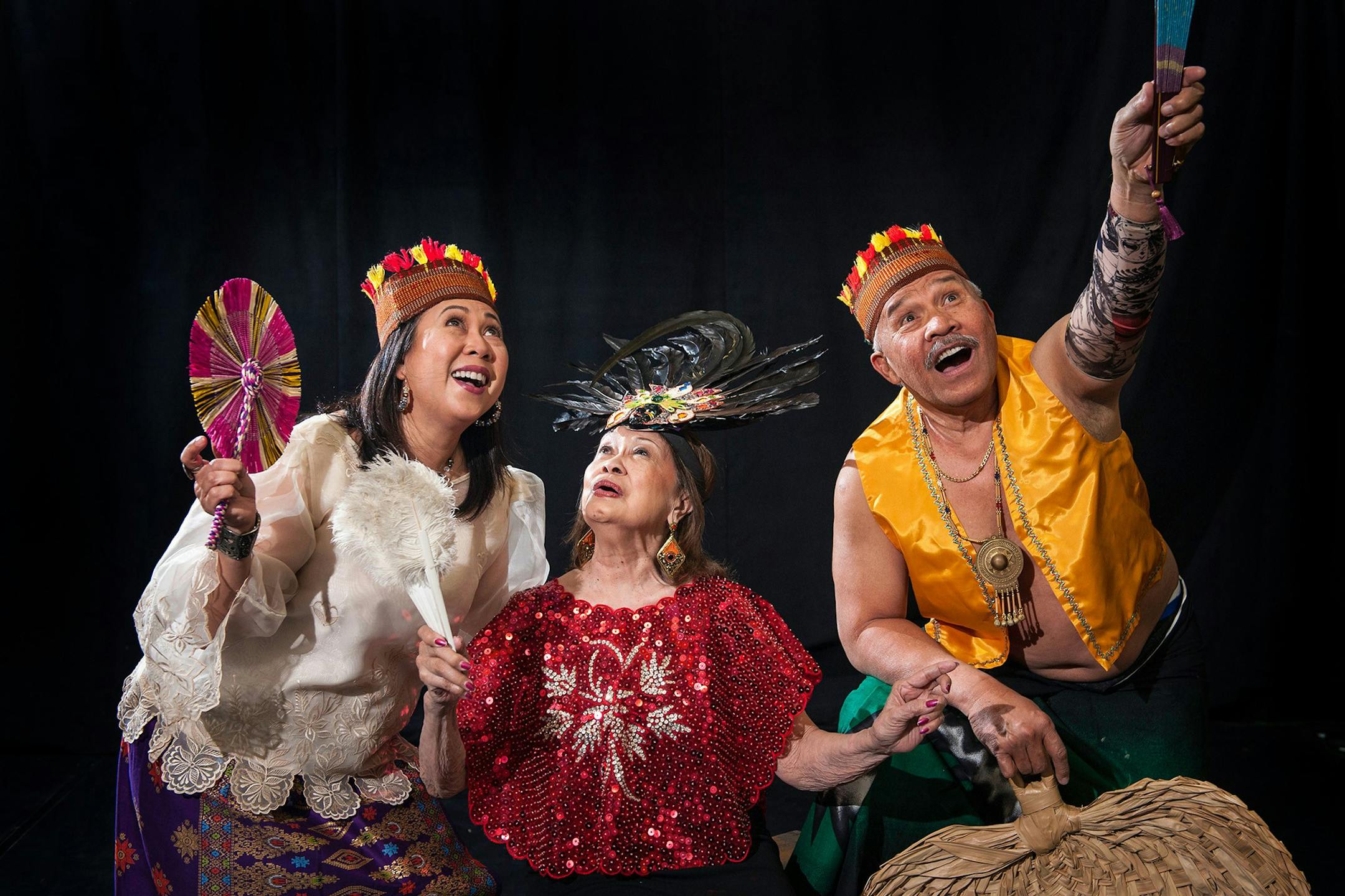 Lita Malicsi, center, with Lyra Hernandez and Mar Alojado, is the narrator of "Isla Tuliro."