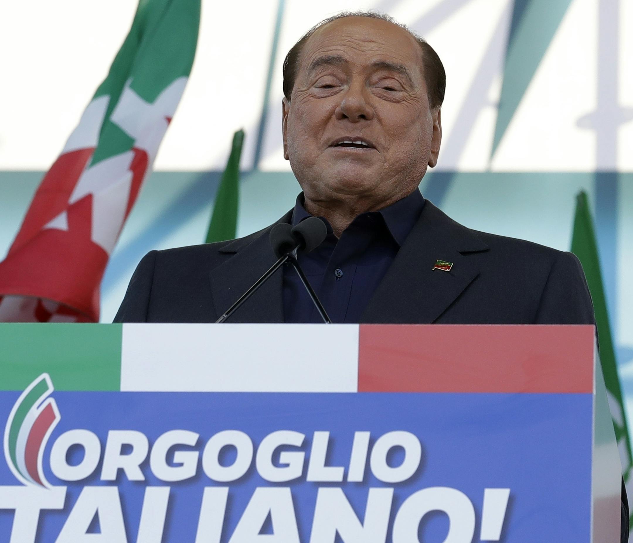 Silvio Berlusconi addresses a rally in Rome, Saturday, Oct. 19, 2019. Thousands of protesters are gathering in Rome for a so-called "Italian Pride" rally, which brings together the right-wing League of Salvini, the far-right Brothers of Italy of Giorgia Meloni and former premier Silvio Berlusconi's Forza Italia. (AP Photo/Andrew Medichini) ORG XMIT: FP112