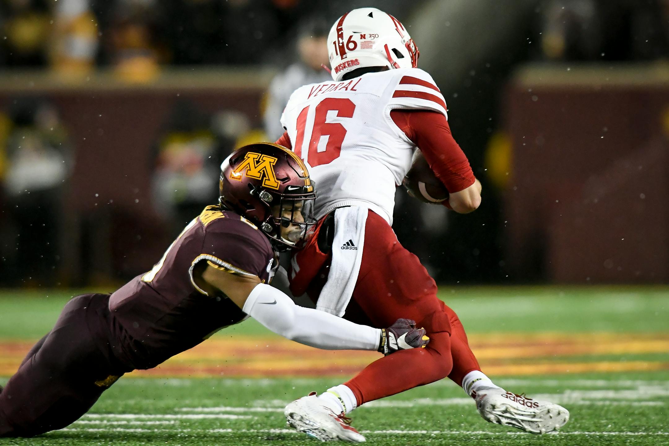 Gophers defensive back Chris Williamson tackled Cornhuskers quarterback Noah Vedral for a loss of yards in the first half. Vedral was starting for the injured Adrian Martinez.