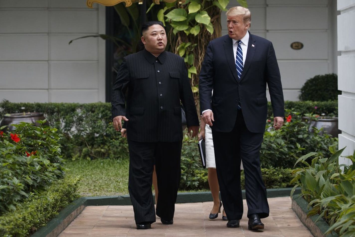 President Donald Trump and North Korean leader Kim Jong Un took a walk after their first meeting at the Sofitel Legend Metropole Hanoi hotel on Thursday.