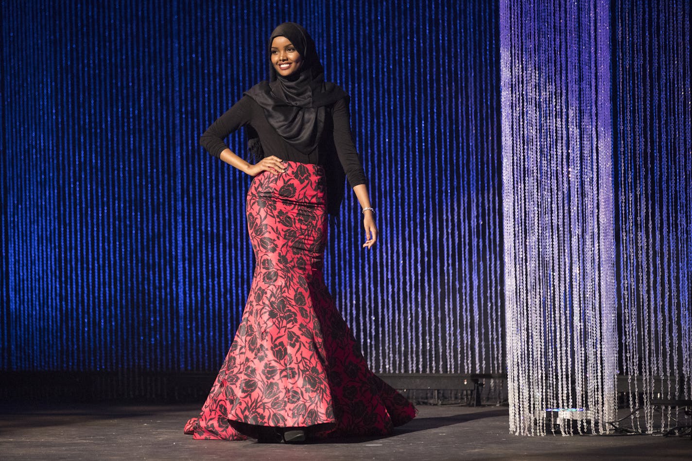 Halima Aden wears a hijab and gown while competing in the preliminary round of the Miss Minnesota USA pageant. ] (Leila Navidi/Star Tribune) leila.navidi@startribune.com BACKGROUND INFORMATION: Halima Aden competes in the preliminary round of the Miss Minnesota USA pageant at the Ames Center in Burnsville on Saturday, November 27, 2016. Somali-American Halima Aden, 19, will become the first woman to compete for the title of Miss Minnesota USA while wearing a burkini, which she hopes will break b