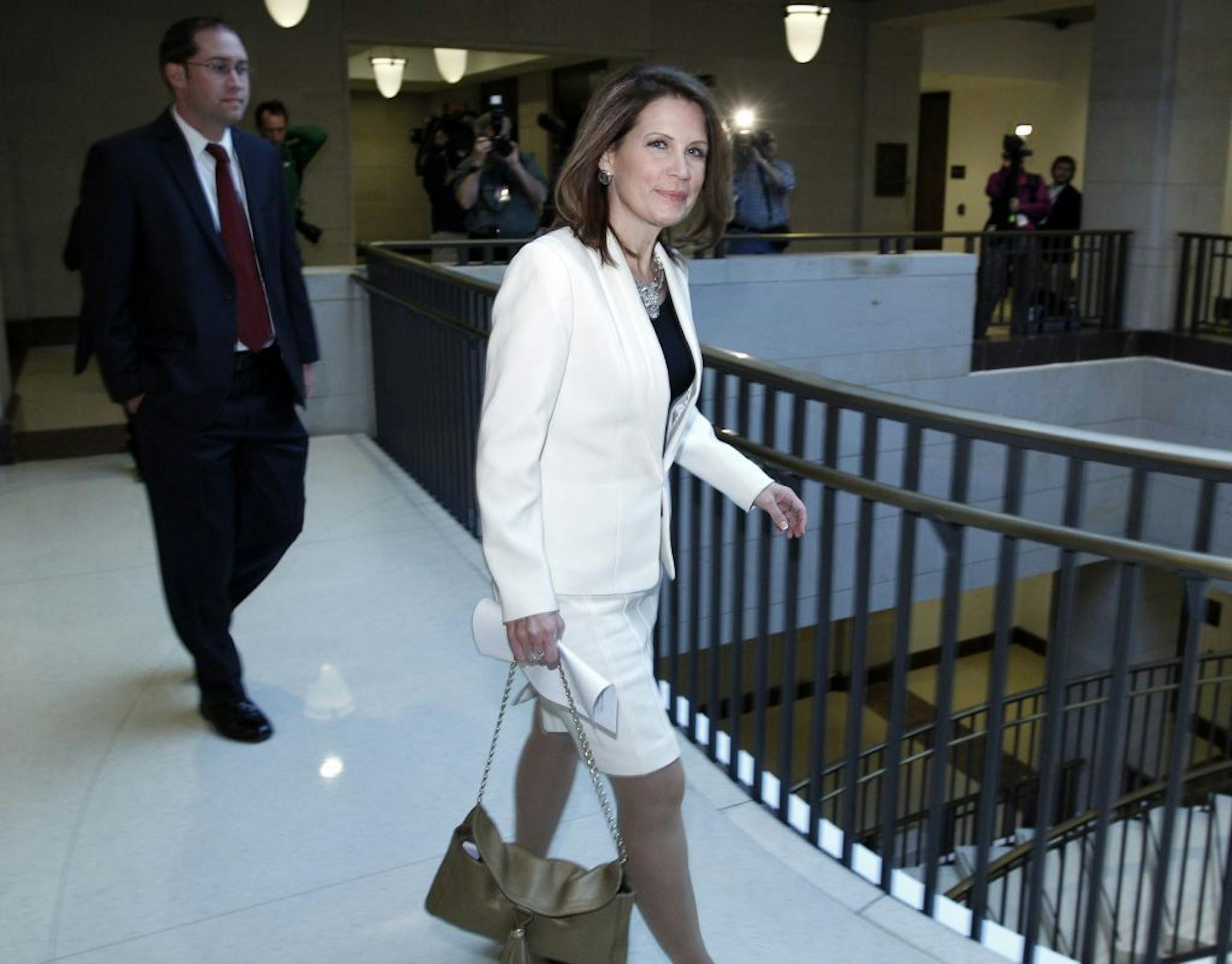 Rep. Michele Bachmann, R-Minn., walks to the hearing room where former CIA Director David Petraeus will testify before the House Intelligence committee on the Sept. 11, 2012 attack in Libya on Capitol Hill in Washington, Friday, Nov. 16, 2012.