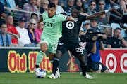 Minnesota United forward Mender García fouls Austin FC defender Nick Lima as they vie for the ball in the first half Saturday