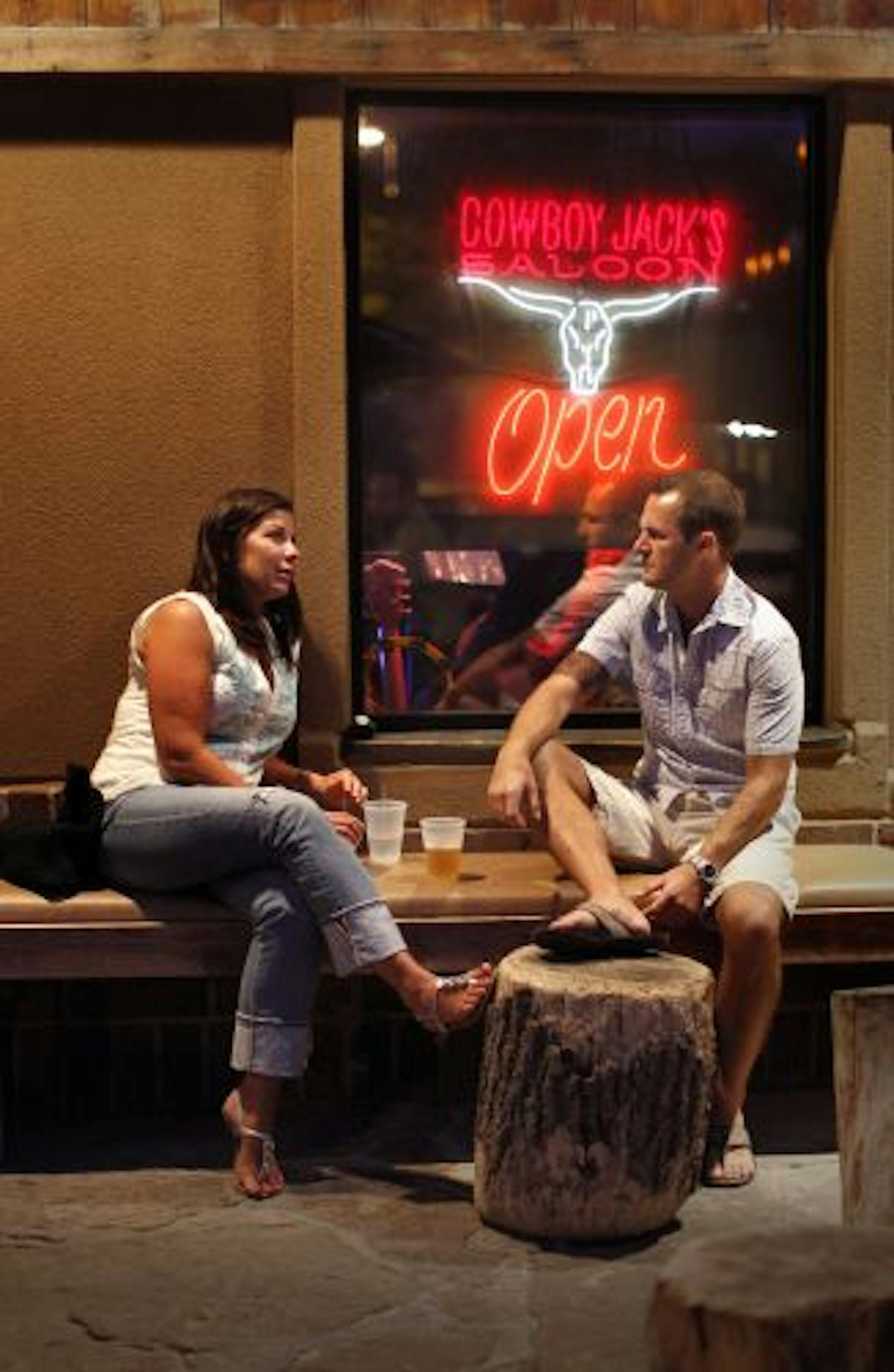 Tim Svensson chatted with date Joy Magloughlin on the patio at Cowboy Jack's. The two met a couple of weeks earlier at the bar and were back for another night.
