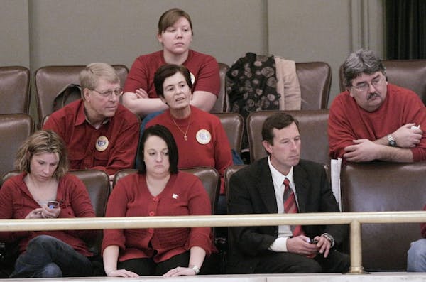 Survivors of the Aug. 1, 2007 Interstate 35W bridge collapse in Minneapolis listen in the Minnesota House gallery Thursday, Feb. 28, 2008 in St. Paul,