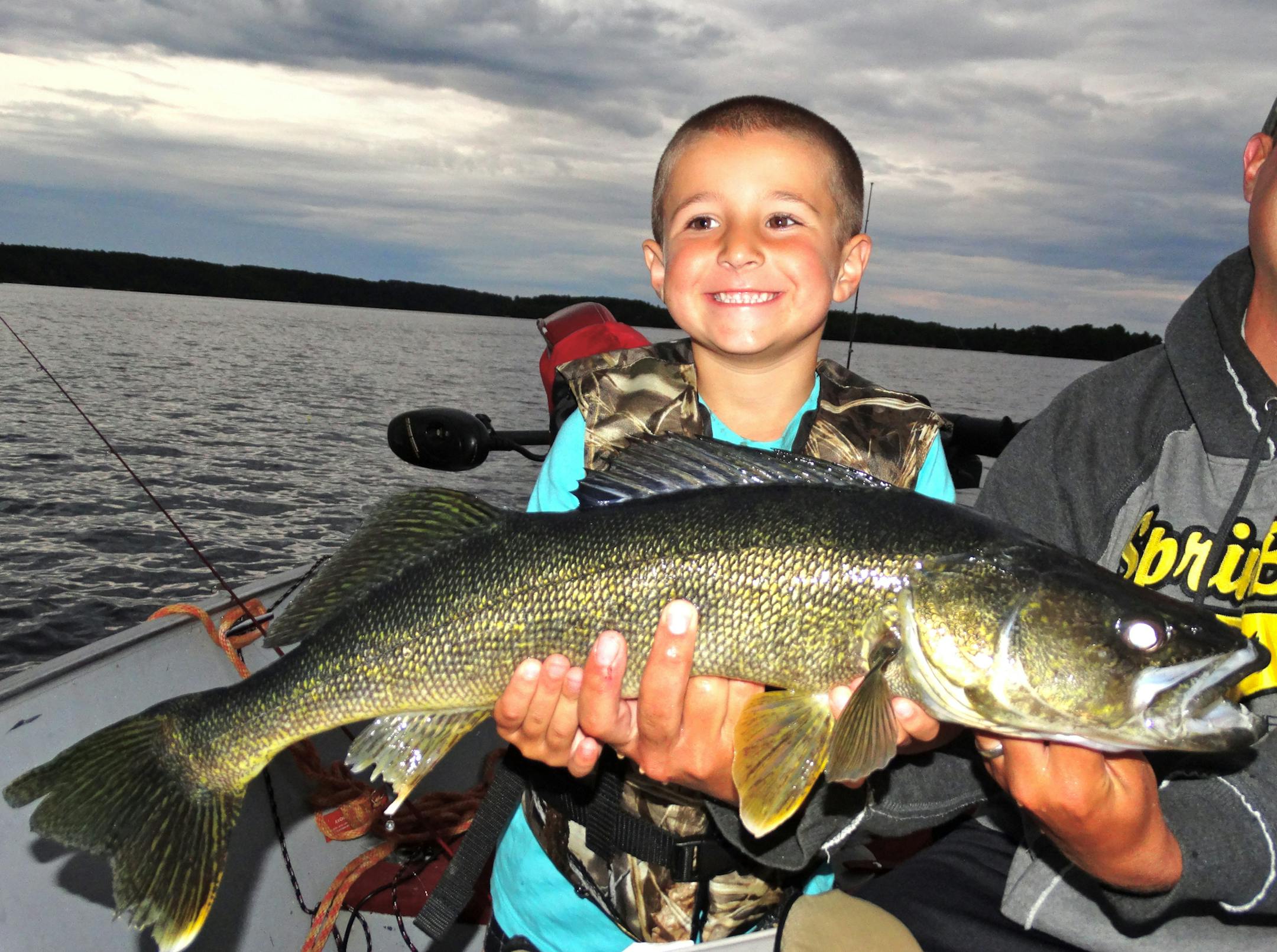 Mason Mjelde, 5, of Buffalo with a 27-inch walleye he caught on Lake Vermilion.