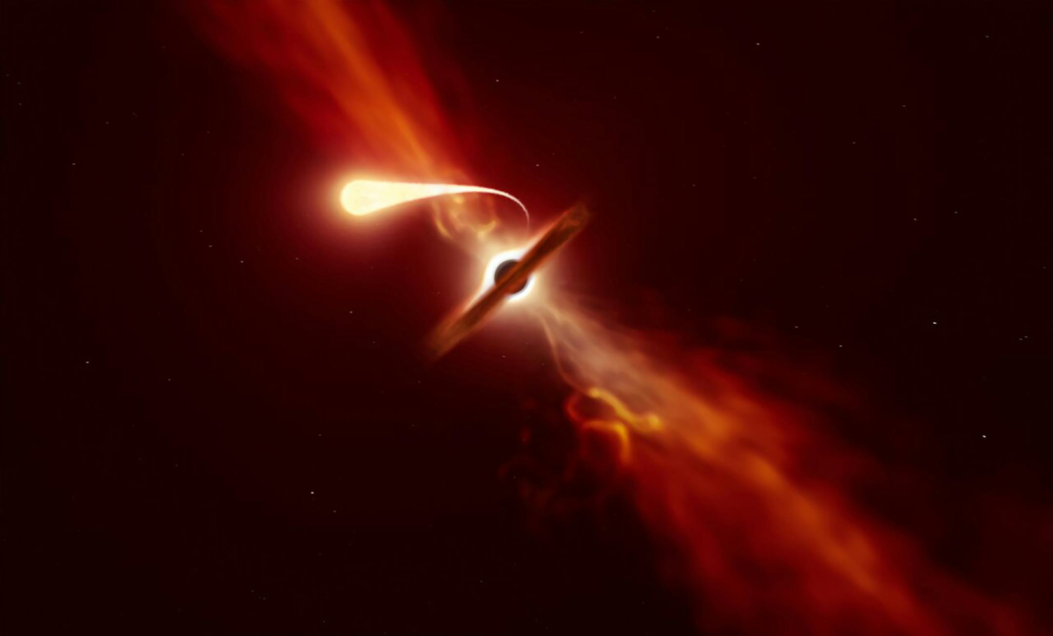 In a photo provided by M. Kornmesser, an artist's concept of a star experiencing "spaghettification" as it's sucked into oblivion by a supermassive black hole during a "tidal disruption event." Astronomers observed a star become a "feast" for a cosmic monster. (M. Kornmesser/ESO via The New York Times) -- NO SALES; FOR EDITORIAL USE ONLY WITH NYT STORY SCI-TIDAL-DISRUPTION BY DENNIS OVERBYE FOR OCT. 17, 2020. ALL OTHER USE PROHIBITED. --