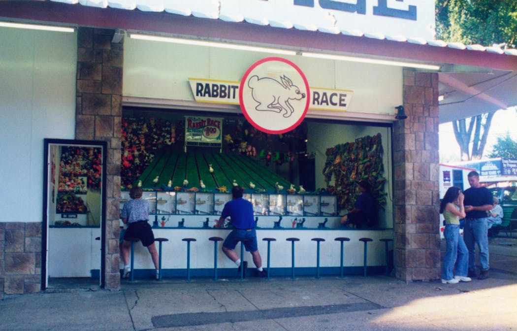 Fairgoers competed in the Rabbit Race game in 1997.