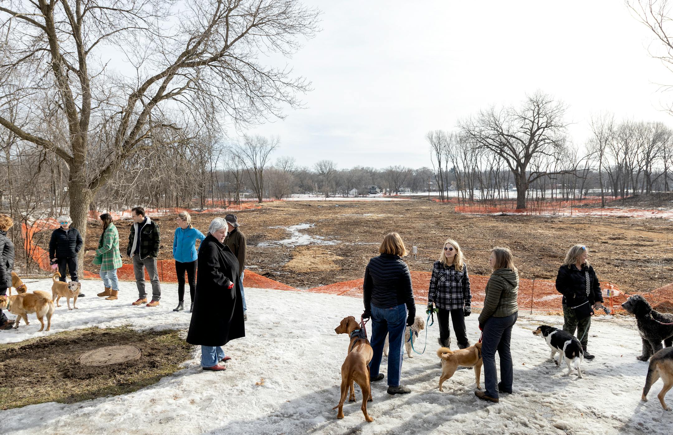 Residents gathered near Weber Park Tuesday, March 15, in Edina, Minn. The City of Edina has razed hundreds of trees to make room for a flood mitigation pond at the site. ] CARLOS GONZALEZ • cgonzalez@startribune.com