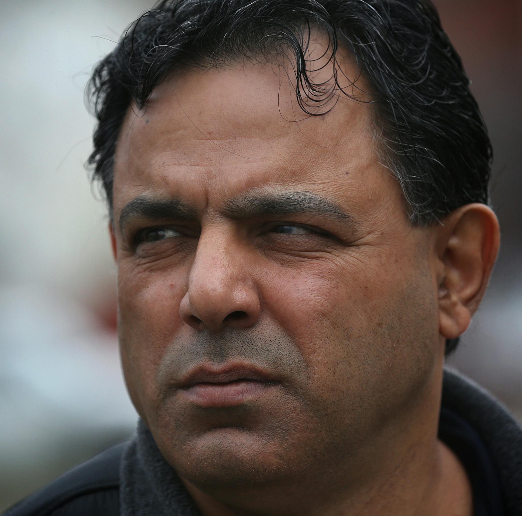 Nader Abuammo looked over the heavy damage caused to his store, Brix Grocery, in the 900 block of West Broadway. Apartments on the upper floors of the building were destroyed. ] JIM GEHRZ ï james.gehrz@startribune.com / Minneapolis, MN / April 24, 2015 /12:00 PM - BACKGROUND INFORMATION: The future of a historic north Minneapolis commercial strip is uncertain more than a week after a blaze ripped through its brick walls. The city said Thursday it won't demolish the properties, leaving build