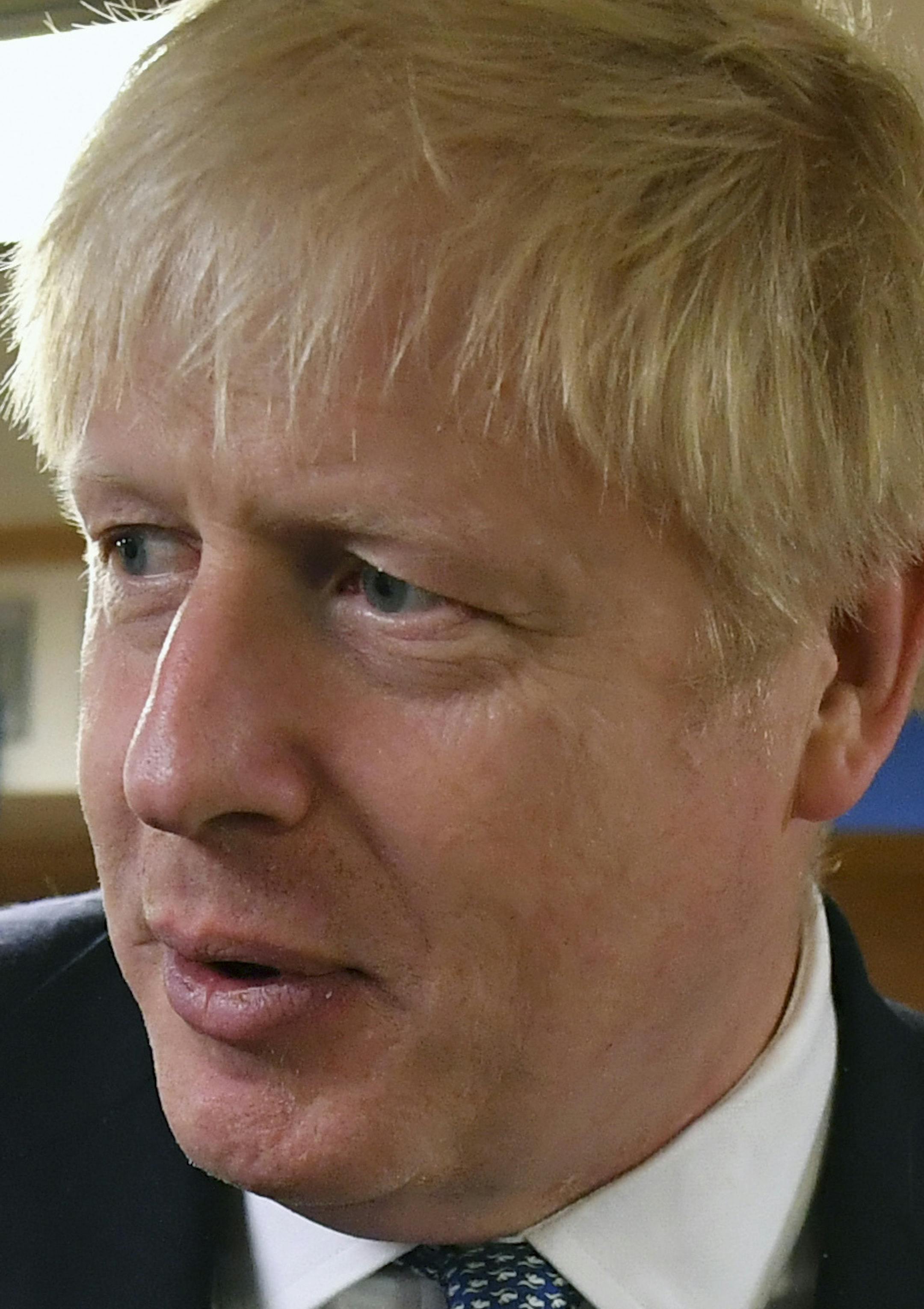 CORRECTING NAME OF BOAT TO HMS VICTORIOUS - Britain's Prime Minister Boris Johnson meets crew members as he tours the nuclear submarine HMS Victorious at the Naval Base in Faslane, Scotland, Monday July 29, 2019. Johnson is expected to announce Monday a 300 million-pound (dollars 371 million US) funding boost to help drive economic growth in Scotland, Wales and Northern Ireland. (Jeff J Mitchell / Pool via AP)