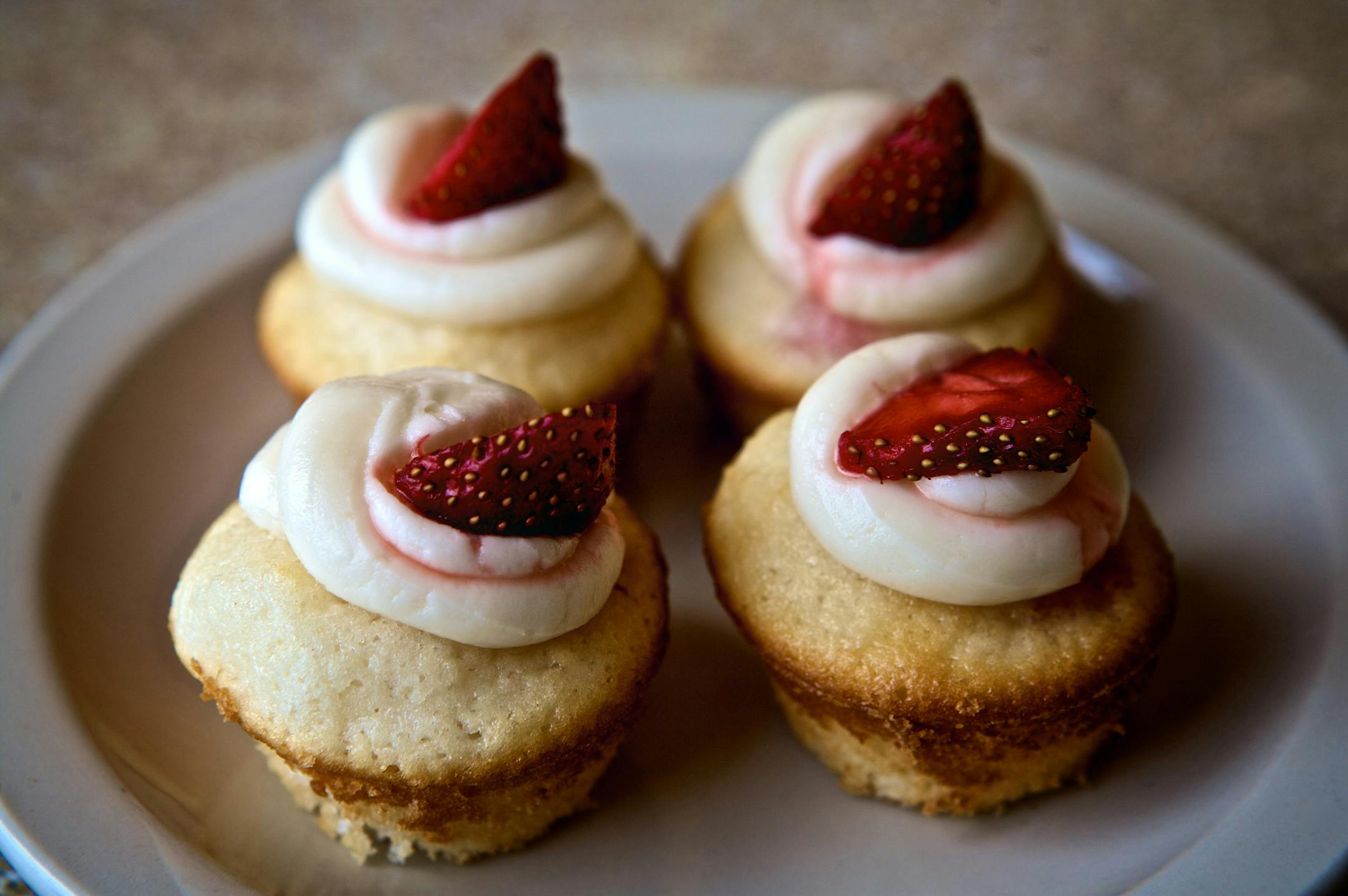 Vanilla-strawberry cupcakes are among the many fresh-baked treats at Rabbit's Bakery in Lake City, Minn.