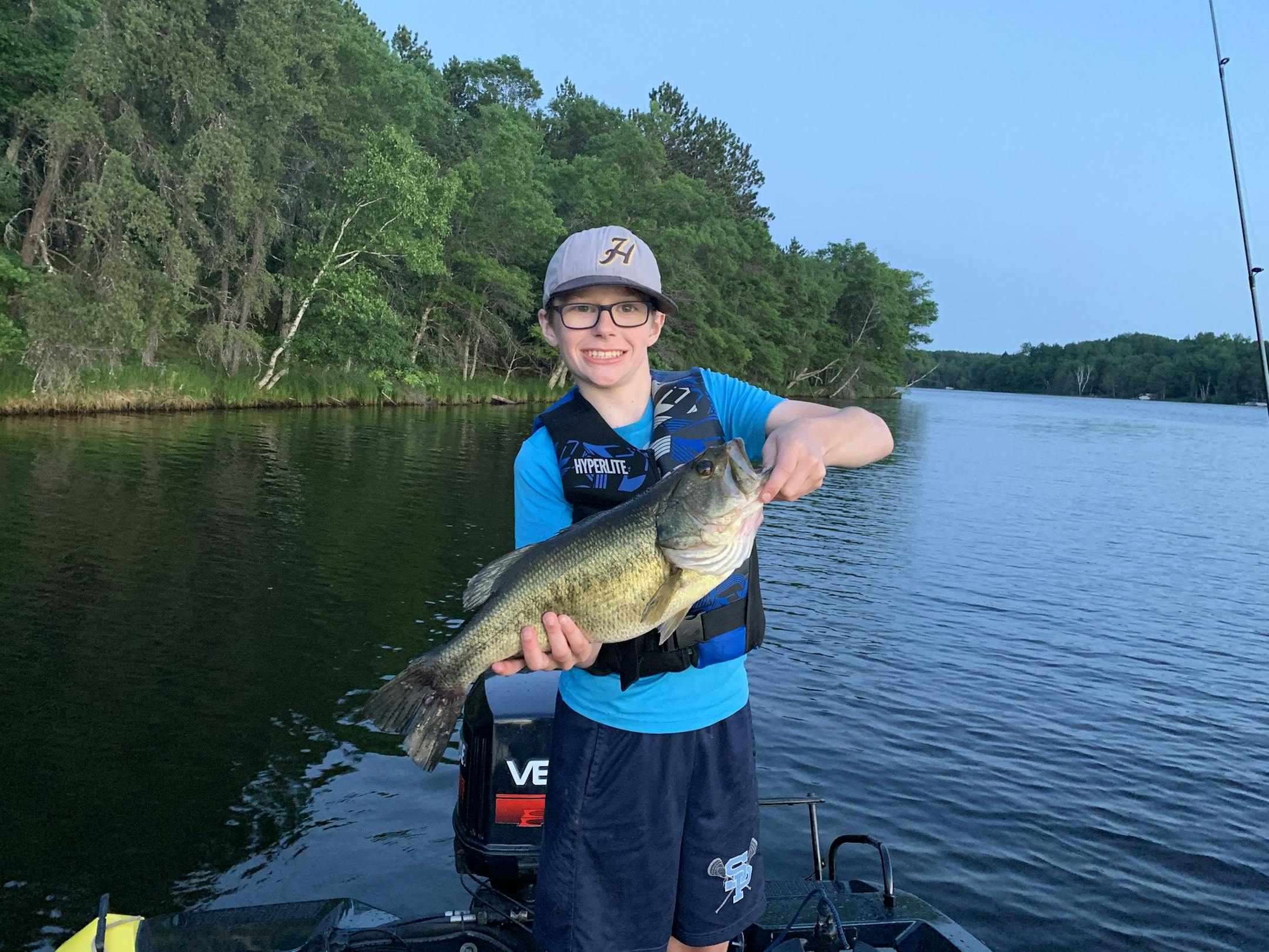 Luke Michels, of St. Paul, caught this 20-inch largemouth bass at his cousins' cabin near Spooner, Wis., last week.