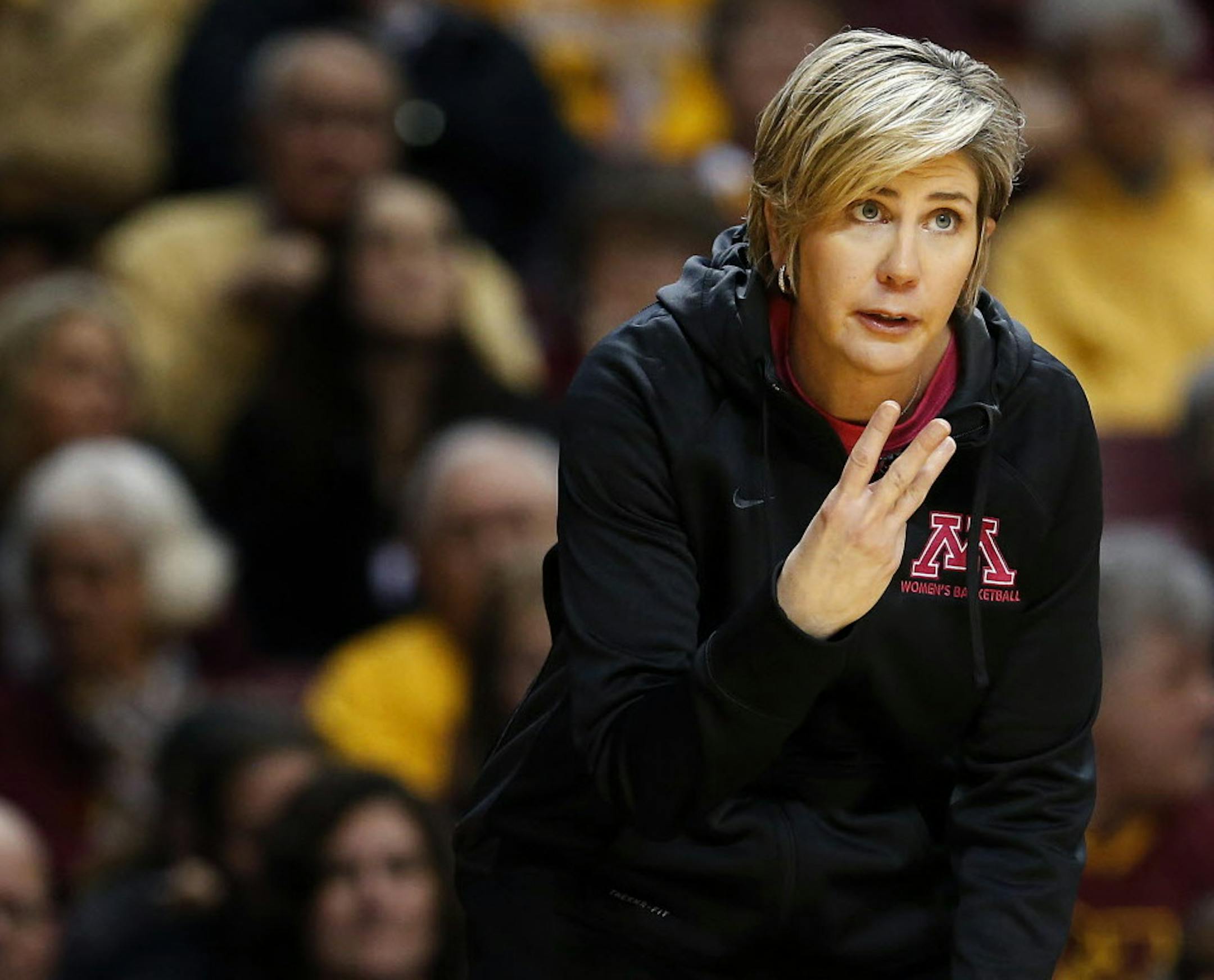 Minnesota head coach Marlene Stollings signals to a player during an NCAA college basketball game against Michigan State, Sunday, Feb. 8, 2015, in Minneapolis. Minnesota won 86-79. (AP Photo/Star Tribune, Carlos Gonzalez) MANDATORY CREDIT; ST. PAUL PIONEER PRESS OUT; MAGS OUT; TWIN CITIES LOCAL TELEVISION OUT ORG XMIT: MIN2015030421010180