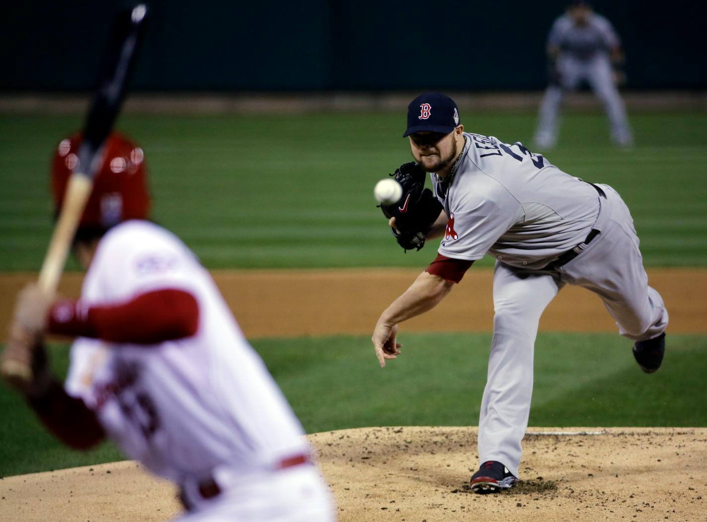 Boston Red Sox starting pitcher Jon Lester throws during the first inning of Game 5 of baseball's World Series against the St. Louis Cardinals on Monday.