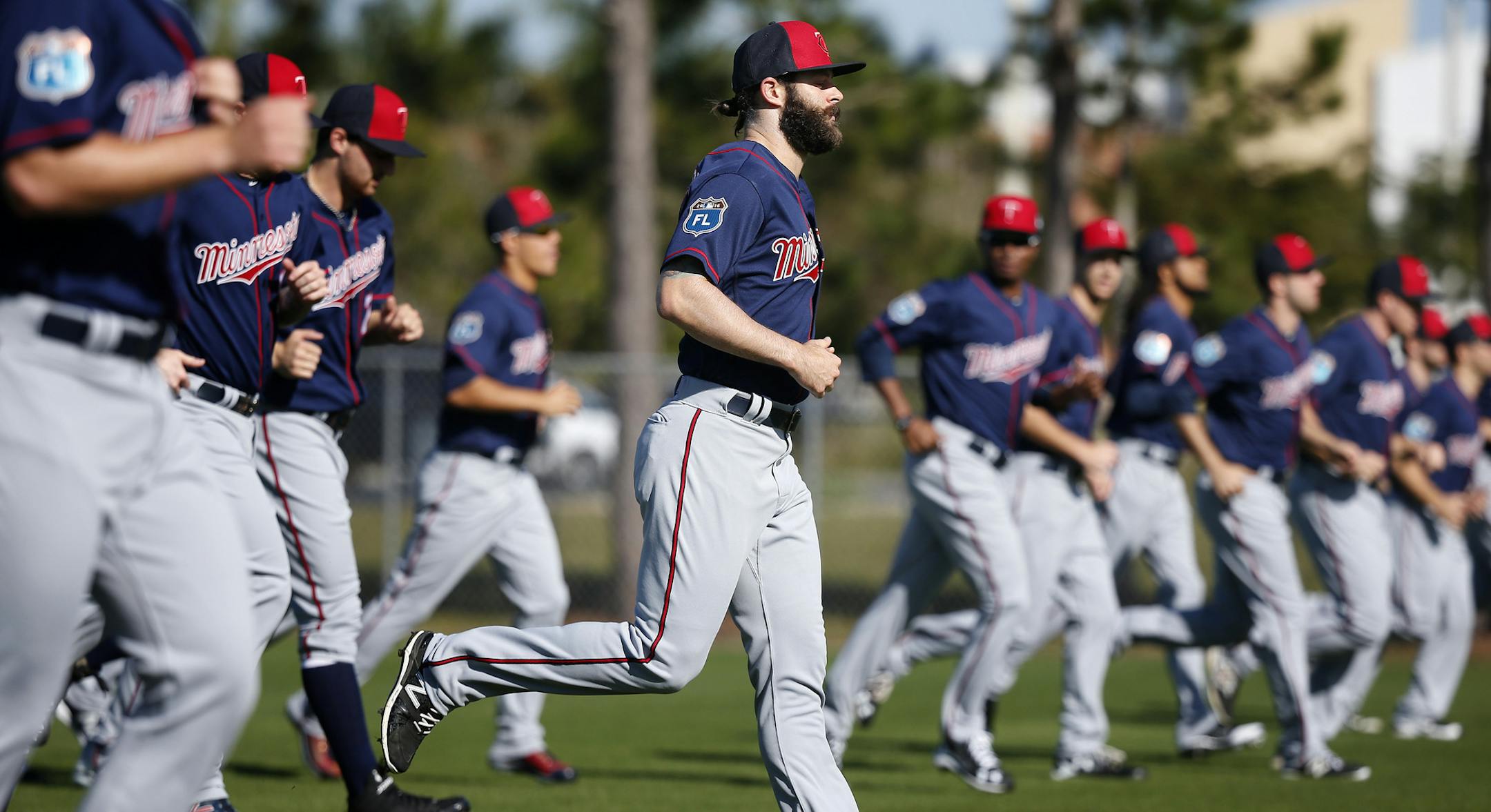 Minnesota Twins pitchers jogged at the beginning of practice. Monday was the first organized practice of spring training for pitchers and catchers. ] CARLOS GONZALEZ cgonzalez@startribune.com - February 22, 2016, Fort Myers, FL, CenturyLink Sports Complex, Minnesota Twins Spring Training, MLB, Baseball, first practice for pitchers and catchers