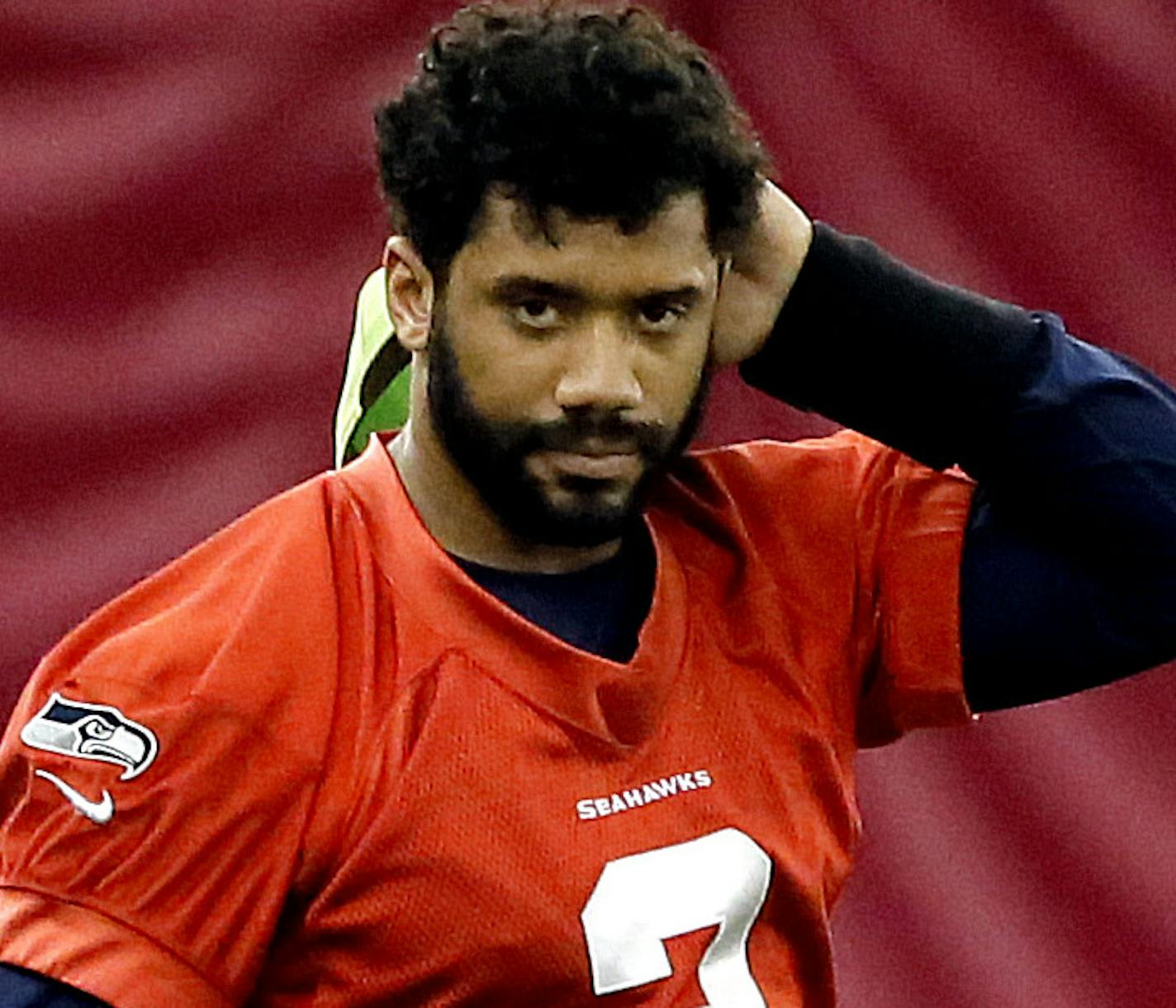 Seattle Seahawks quarterback Russell Wilson (3) runs drills during a team practice for NFL Super Bowl XLIX football game, Friday, Jan. 30, 2015, in Tempe, Ariz. The Seahawks play the New England Patriots in Super Bowl XLIX on Sunday, Feb. 1, 2015. (AP Photo/Matt York)