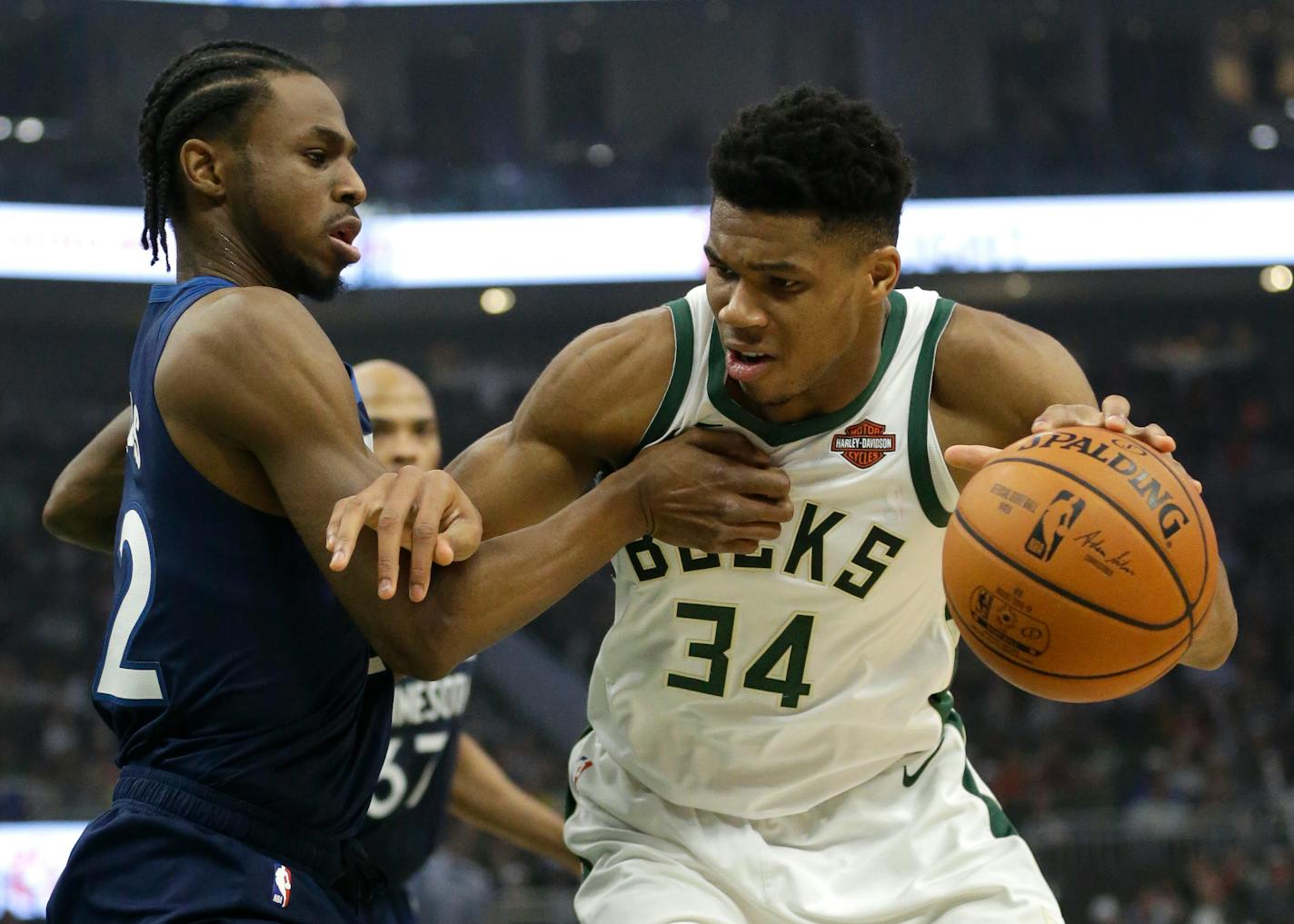 Milwaukee's Giannis Antetokounmpo drives against Timberwolves' Andrew Wiggins during the second half