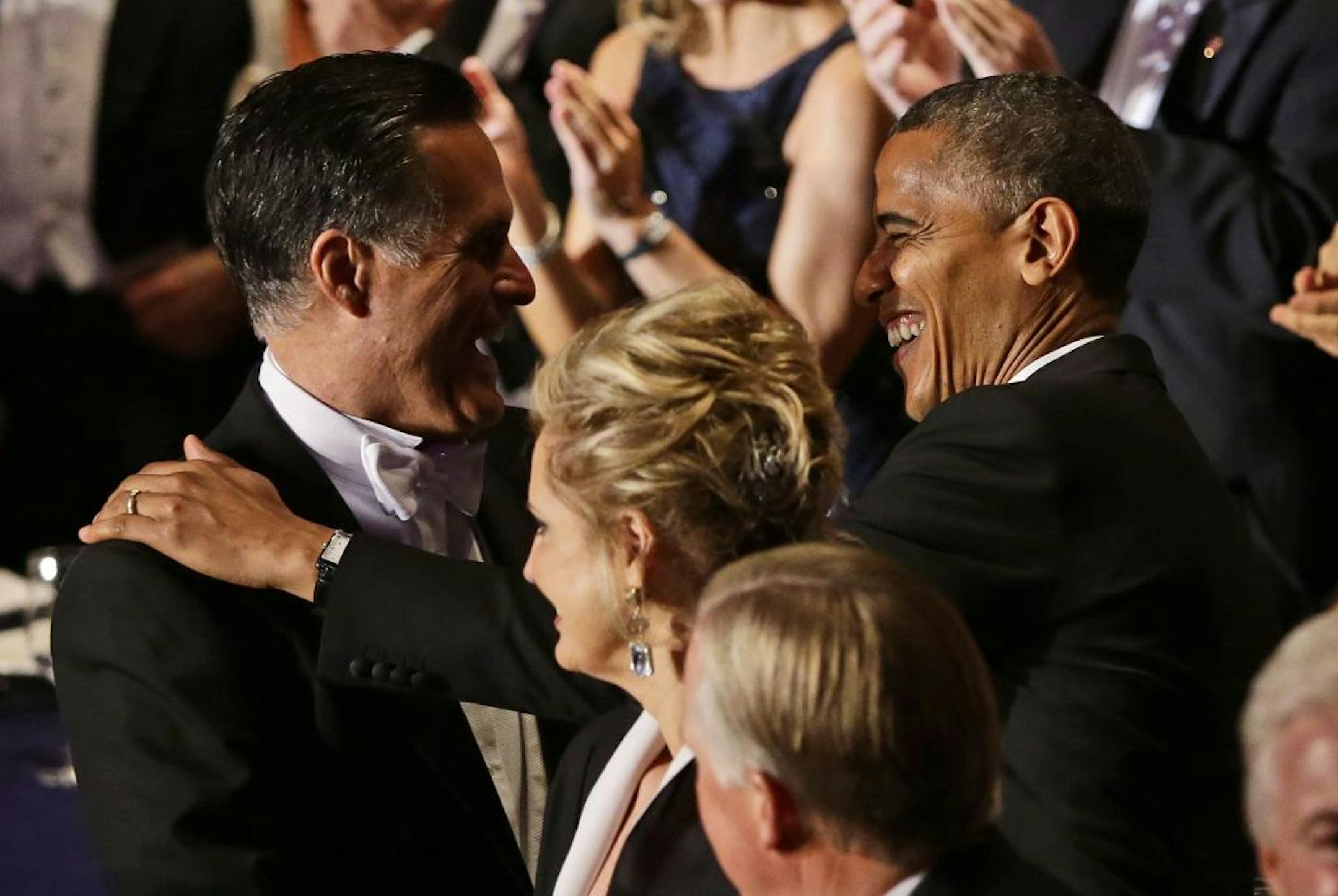 Republican presidential candidate and former Massachusetts Gov. Mitt Romney and President Barack Obama greet each other as they attend the 67th annual Alfred E. Smith Memorial Foundation Dinner, a charity gala organized by the Archdiocese of New York, Thursday, Oct. 18, 2012, at the Waldorf Astoria hotel in New York.