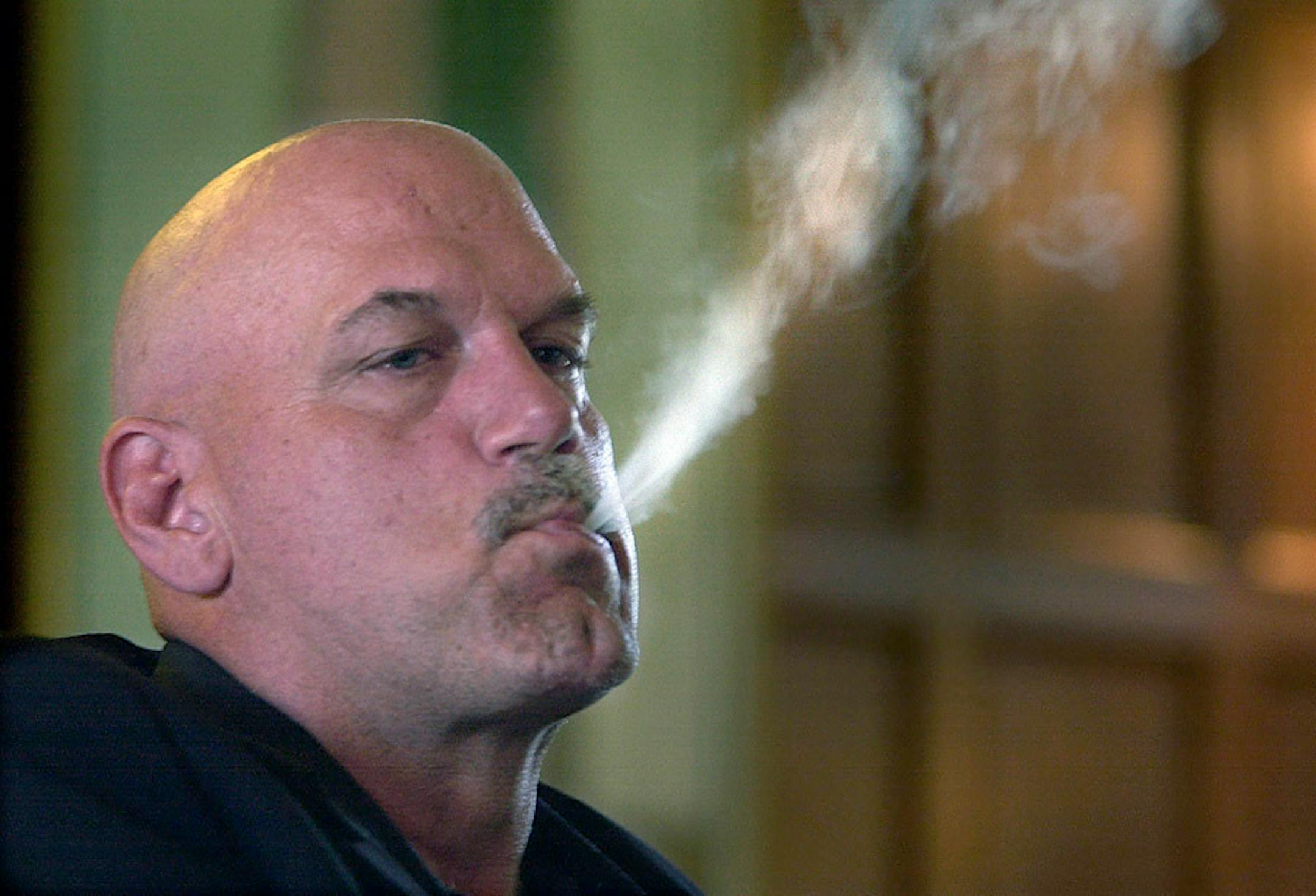 Gov. Jesse Ventura invited the media for one on one interviews at the Governor's Residence.
IN THIS PHOTO: During the interview, Ventura smoked a cigar, constantly blowing smoke and puffing away. He spoke about the current budget impasse to about a dozen media outlets Tuesday, including NPR and ABC-TV's "Good Morning America" morning show. Tuesday 6/12/2001