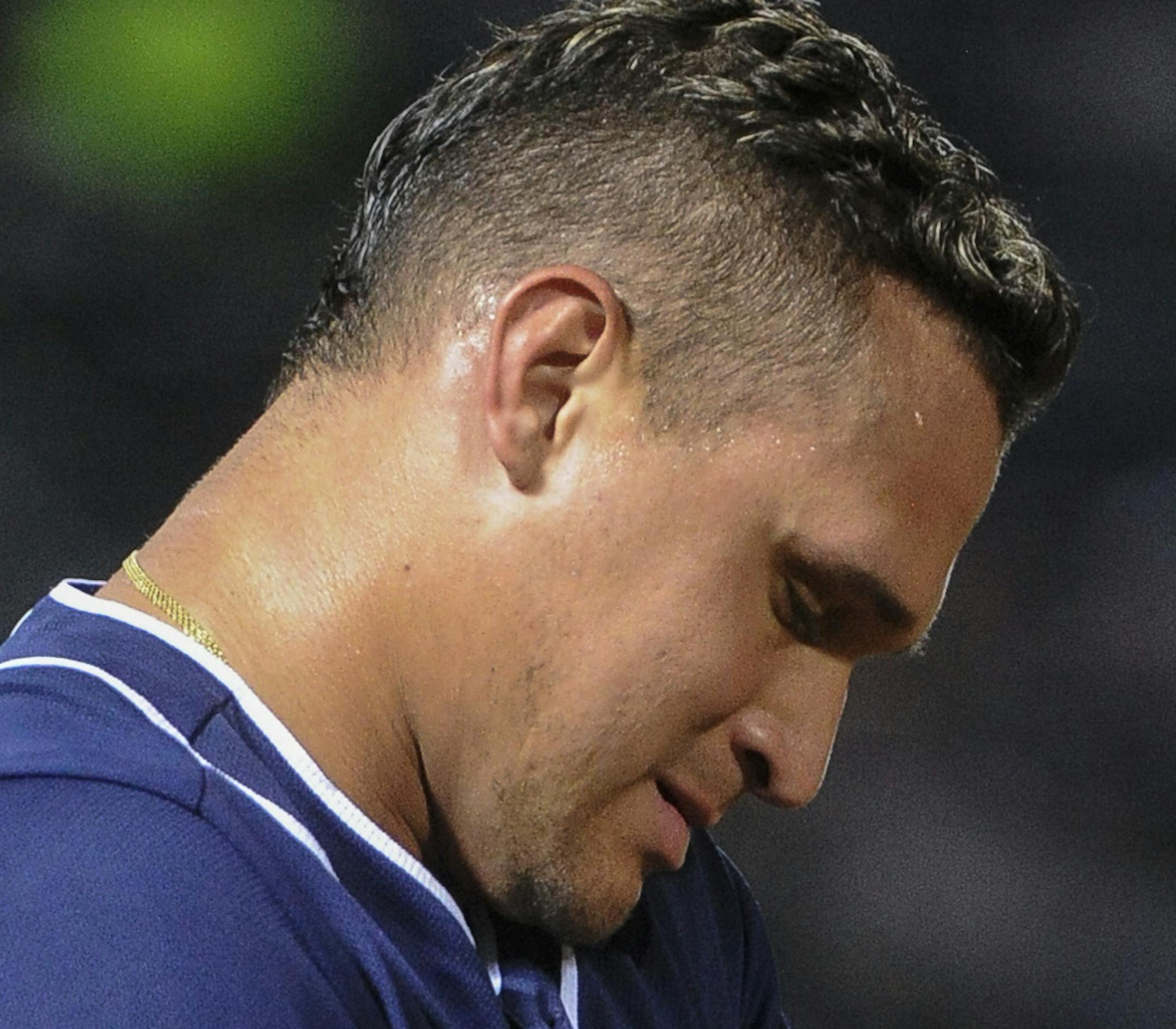 San Diego Padres right fielder Oswaldo Arcia (34) gets ready to take the field against the Atlanta Braves during the sixth inning of a baseball game, Wednesday, August 31, 2016, in Atlanta. (AP Photo/John Amis)