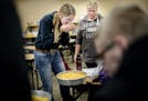 Morgan Uphoff and Anna Salber took turns smelling corn during a corn grading segment of their Ag Business class at Ridgewater College, Willmar. ] GLEN