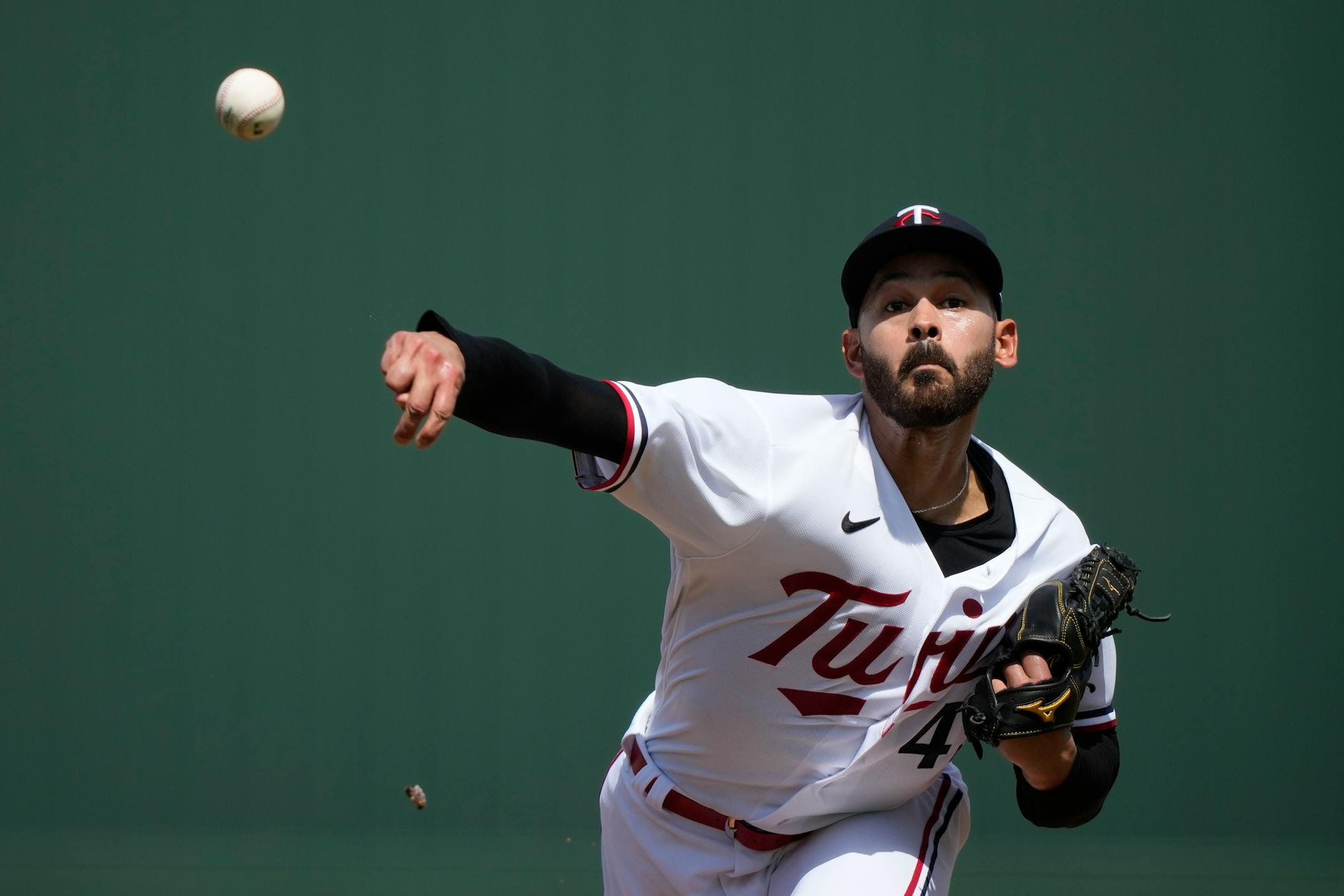 Minnesota Twins starting pitcher Pablo Lopez throws in the first inning of a spring training baseball game against the Detroit Tigers in Fort Myers, Fla., Sunday, March 5, 2023. (AP Photo/Gerald Herbert)