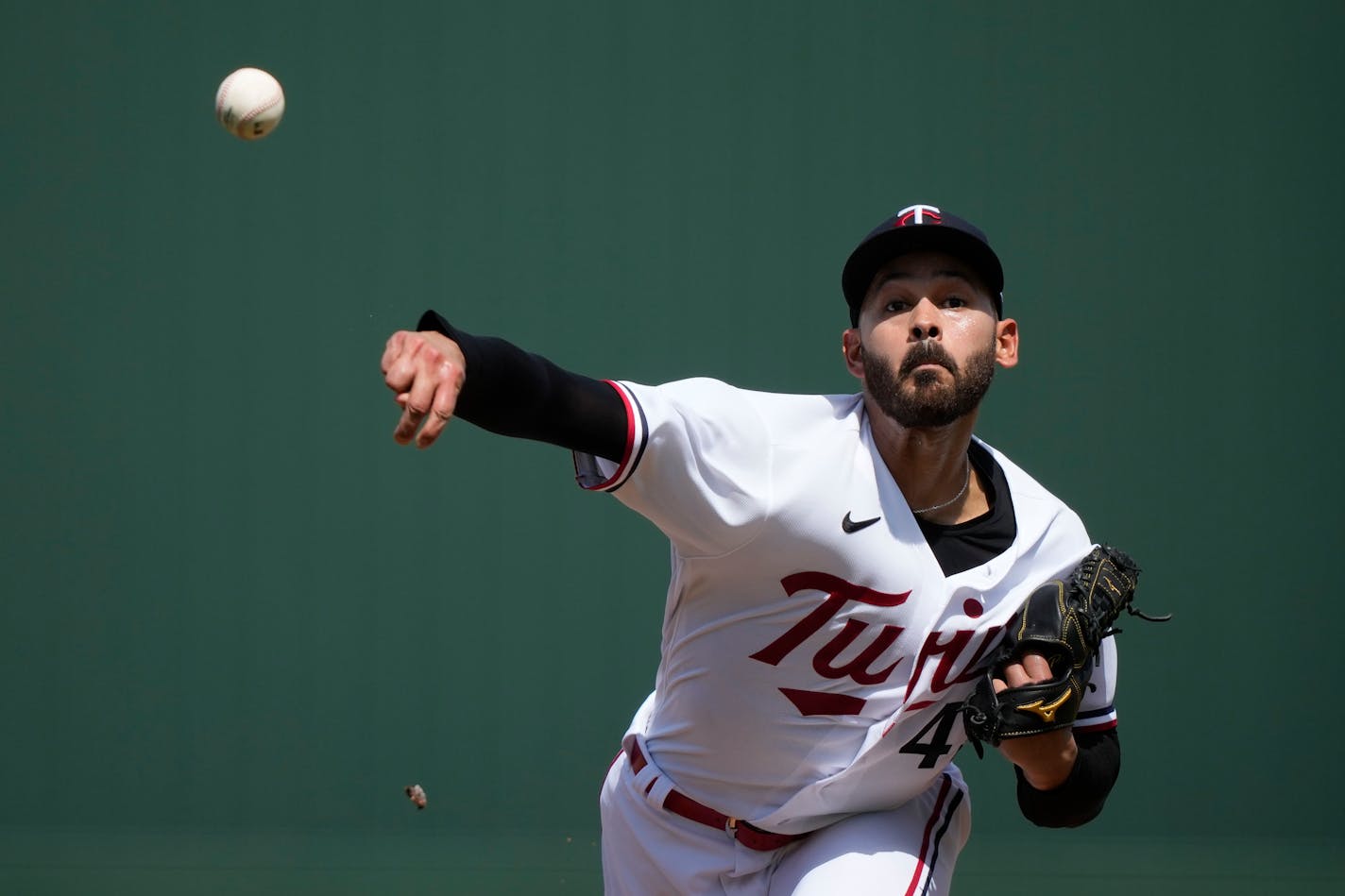 Minnesota Twins starting pitcher Pablo Lopez throws in the first inning of a spring training baseball game against the Detroit Tigers in Fort Myers, Fla., Sunday, March 5, 2023. (AP Photo/Gerald Herbert)