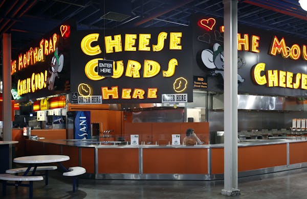 Dave Cavallaro at his fried cheese curd stand in the Food Building of the Minnesota State Fair.
