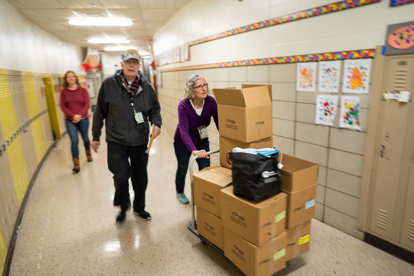 Volunteers with The Sheridan Story distributed meals at a south Minneapolis elementary school. The Sheridan Story received a revolving credit line from the Otto Bremer Trust to help the nonprofit fund its programs.