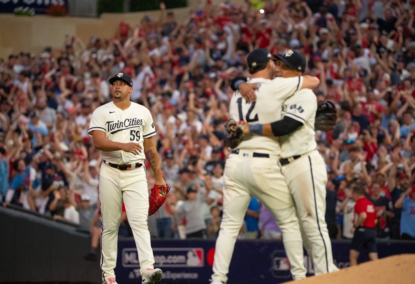 Minnesota Twins relief pitcher Jhoan Duran as teammates celebrated the final out of the game. The Minnesota Twins defeated the Toronto Blue Jays 3-1 in Game 1 of their American League Wild Card Series Tuesday afternoon, October 3, 2023 at Target Field in Minneapolis. ] JEFF WHEELER • jeff.wheeler@startribune.com