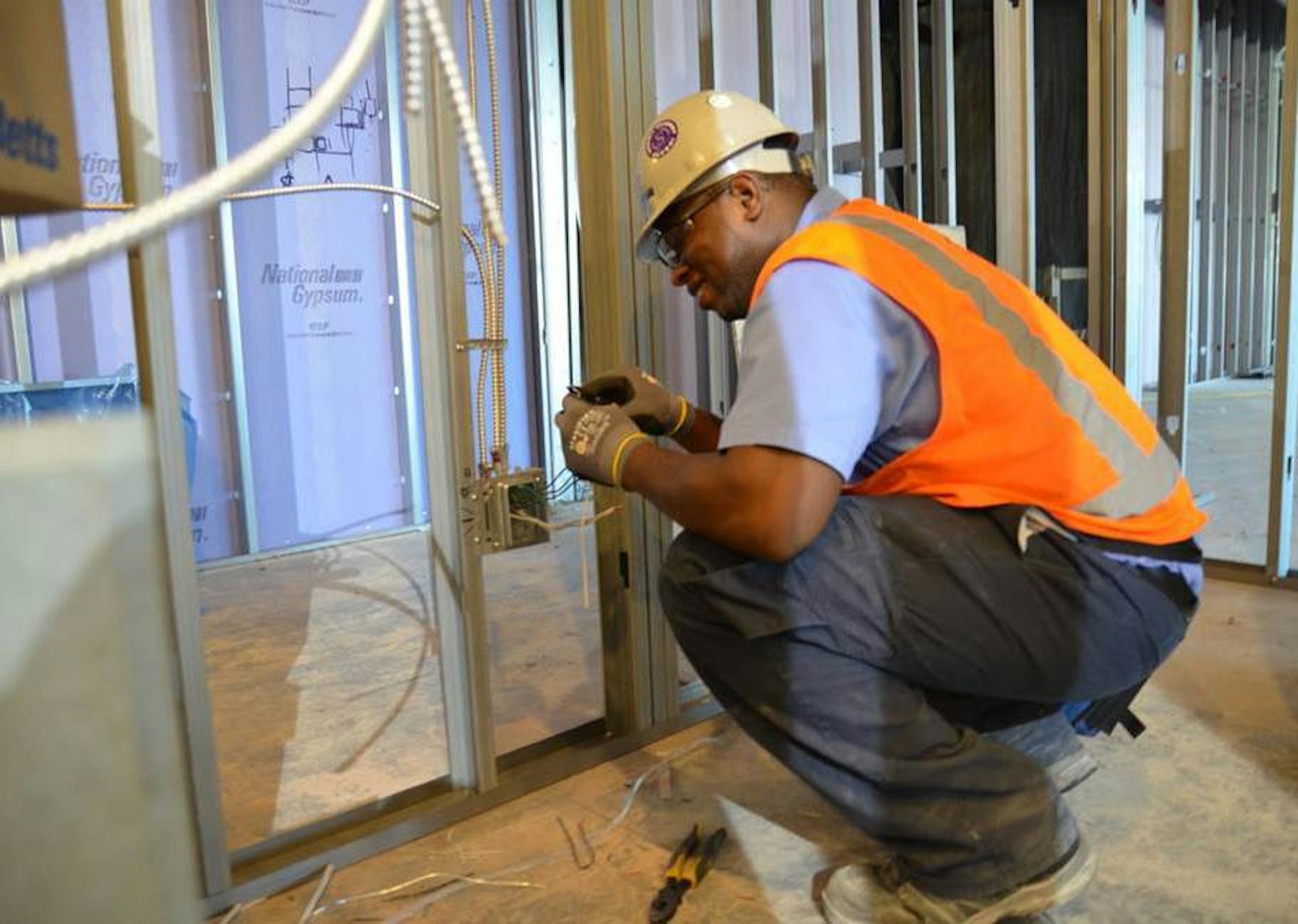 Isaiah Campbell, a pre-apprentice electrician with Hunt Electric, worked on the Wells Fargo towers in Downtown East throughout 2015.