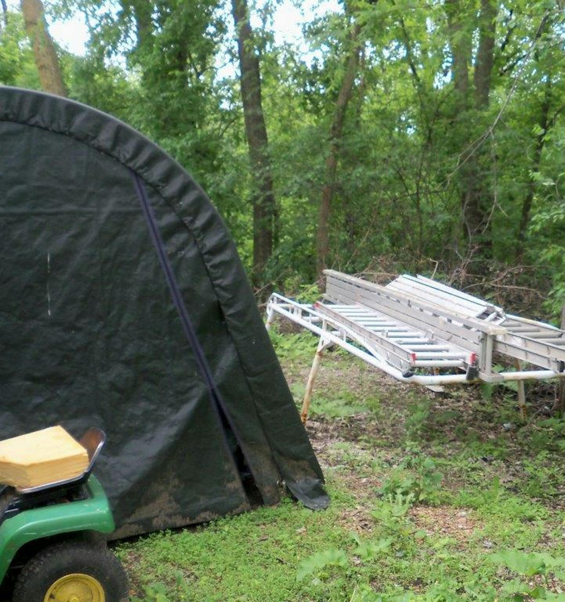 These ladders were violating a zoning ordinance about exterior storage. The photo was offered as evidence at a June court hearing that resulted in a five-day sentence for James Barth.