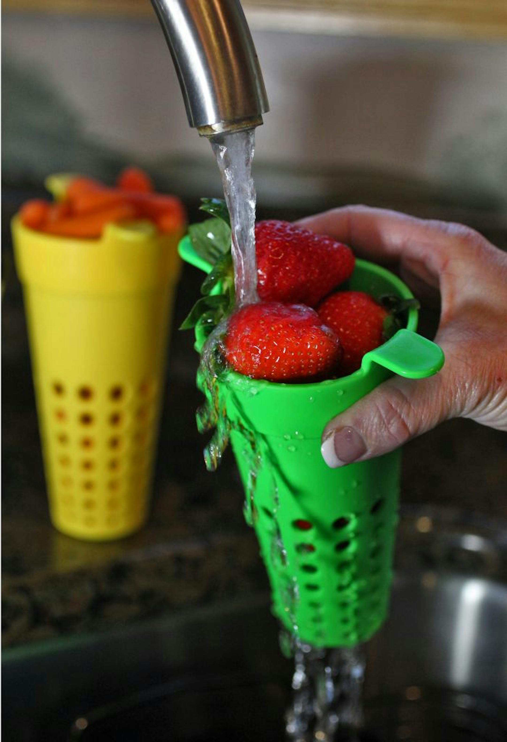 Dan McDonald is an intellectual property attorney from Shoreview who has patented the common place article - a kitchen strainer called the Aardvark Strainer. He and his wife Kim McDonald market the strainer as a way to mix ice cream floats, chill drinks without ice cubes and rinse fruits and vegetables. Kim McDonald demonstrated how to rinse fruit such as strawberries with the Aardvark.