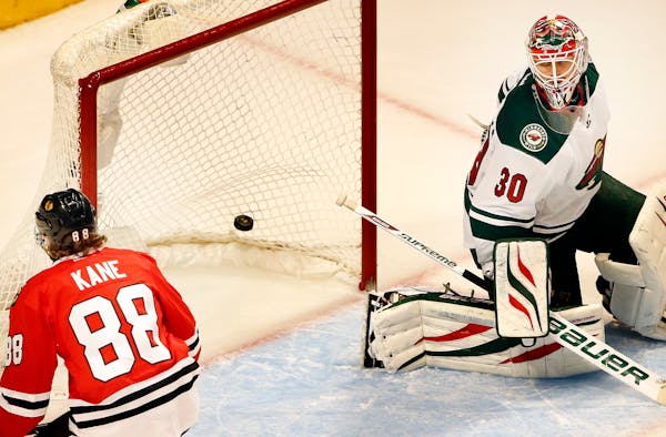 Patrick Kane shot the puck past Wild goalie Ilya Bryzgalov for a goal in the third period. The goal was his second of the period.